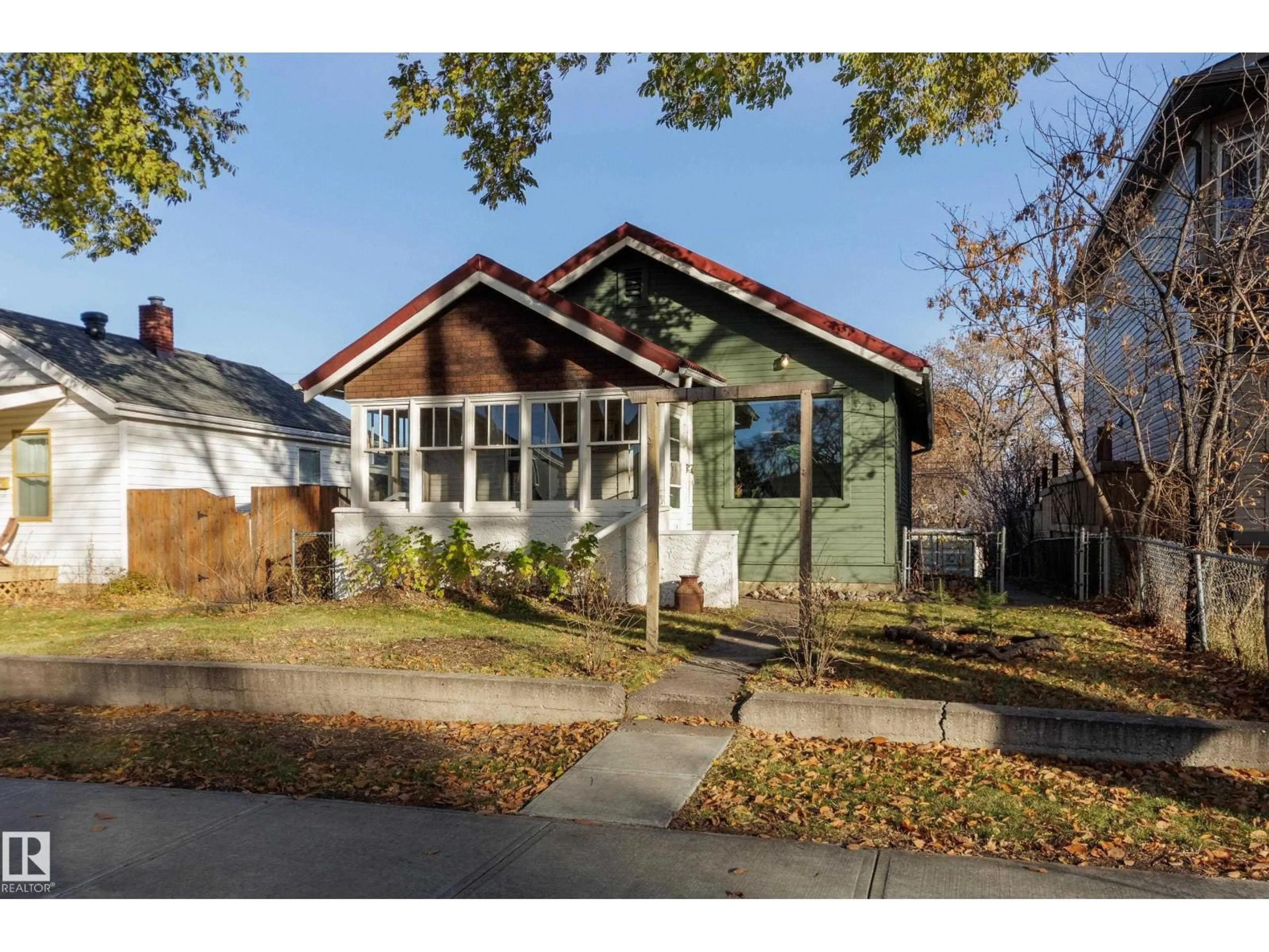Home with brick exterior material, street for NW - 11933 63 ST, Edmonton Alberta T5W4G2