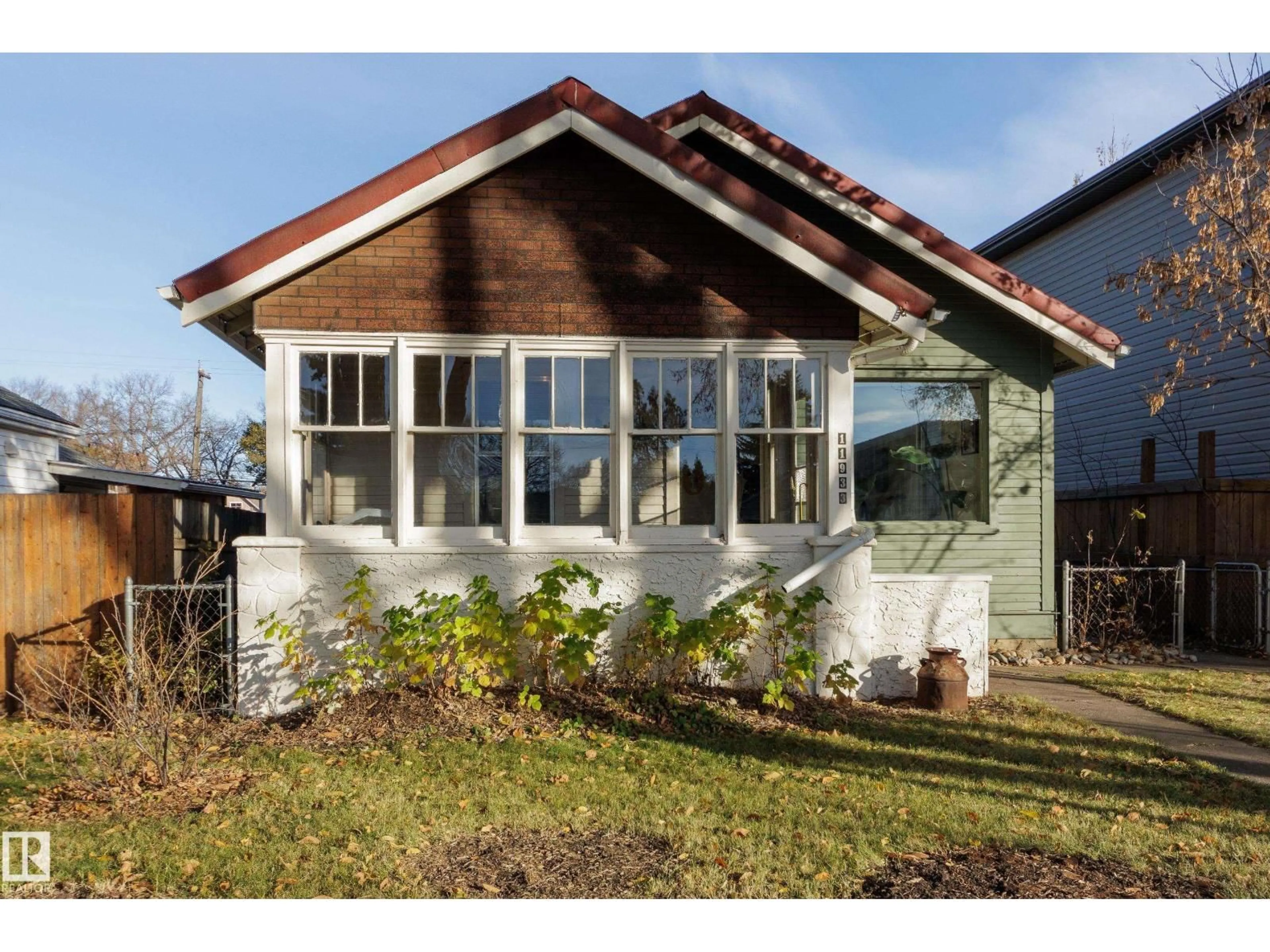 Home with brick exterior material, building for NW - 11933 63 ST, Edmonton Alberta T5W4G2