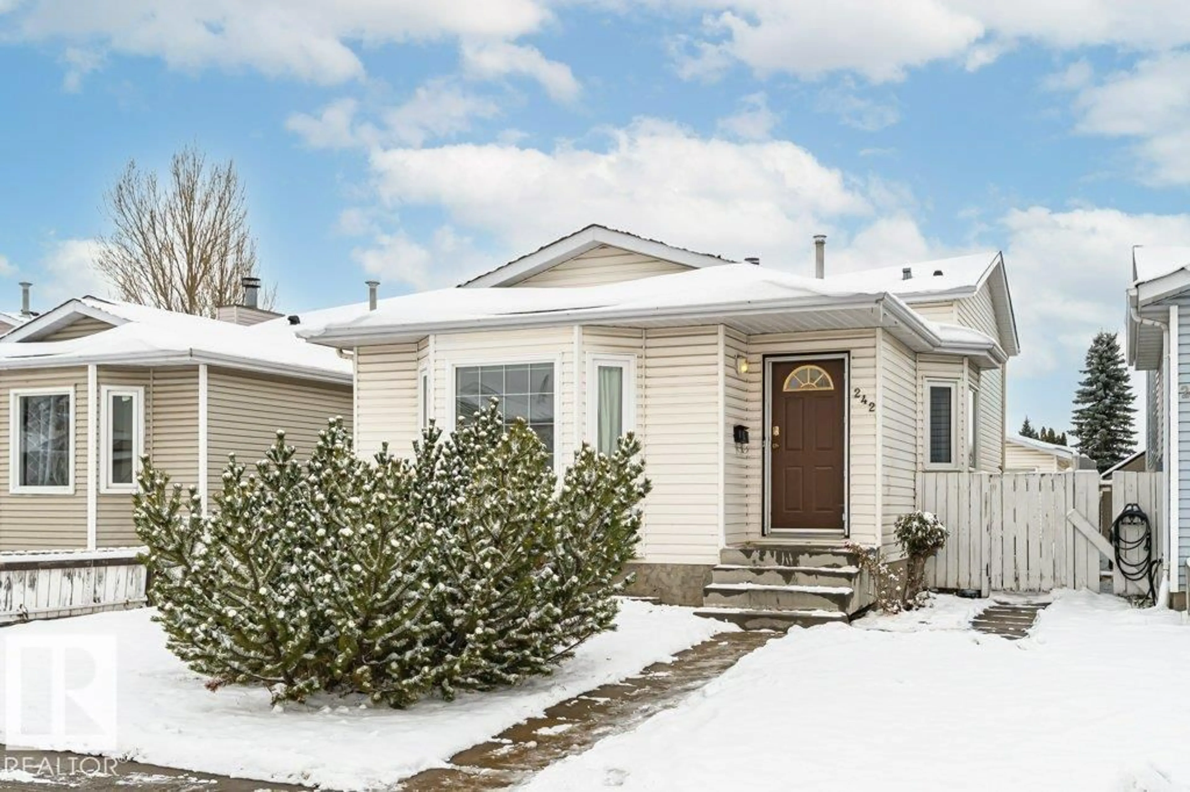Home with vinyl exterior material, street for 242 KIRKWOOD AV, Edmonton Alberta T6L5A8