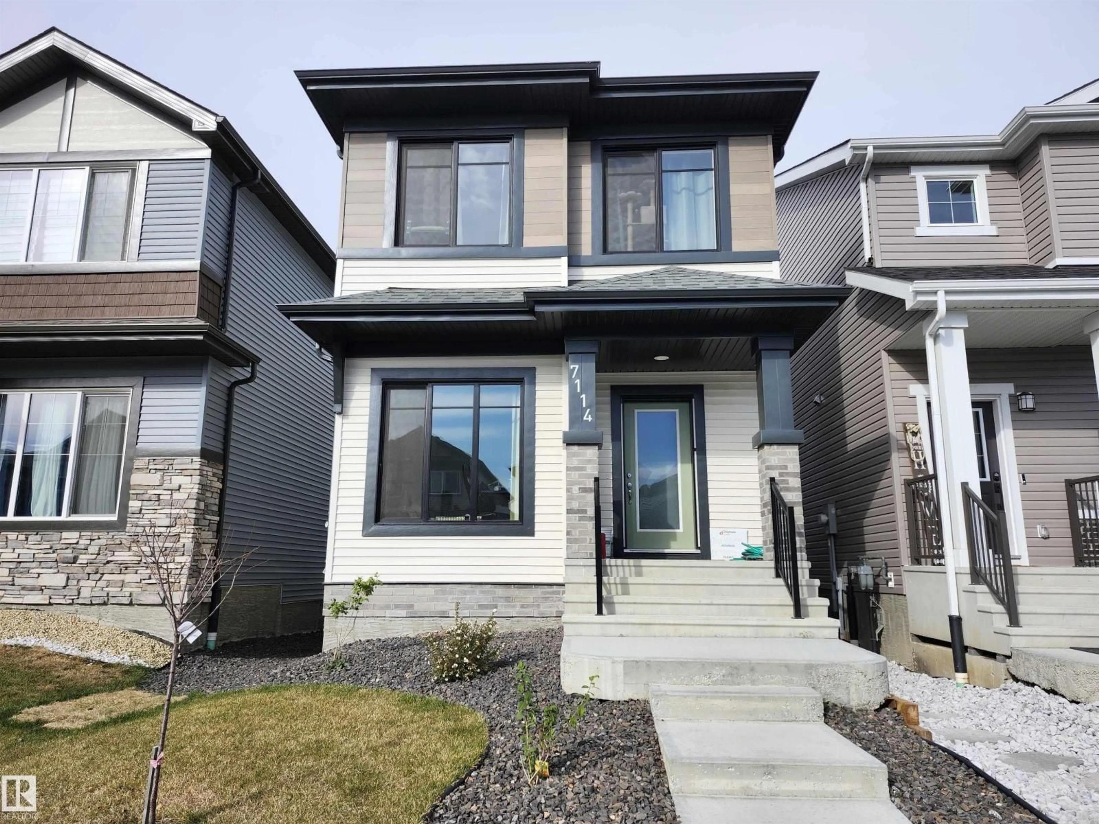 Home with vinyl exterior material, street for 7114 177A AV, Edmonton Alberta T5Z0T4