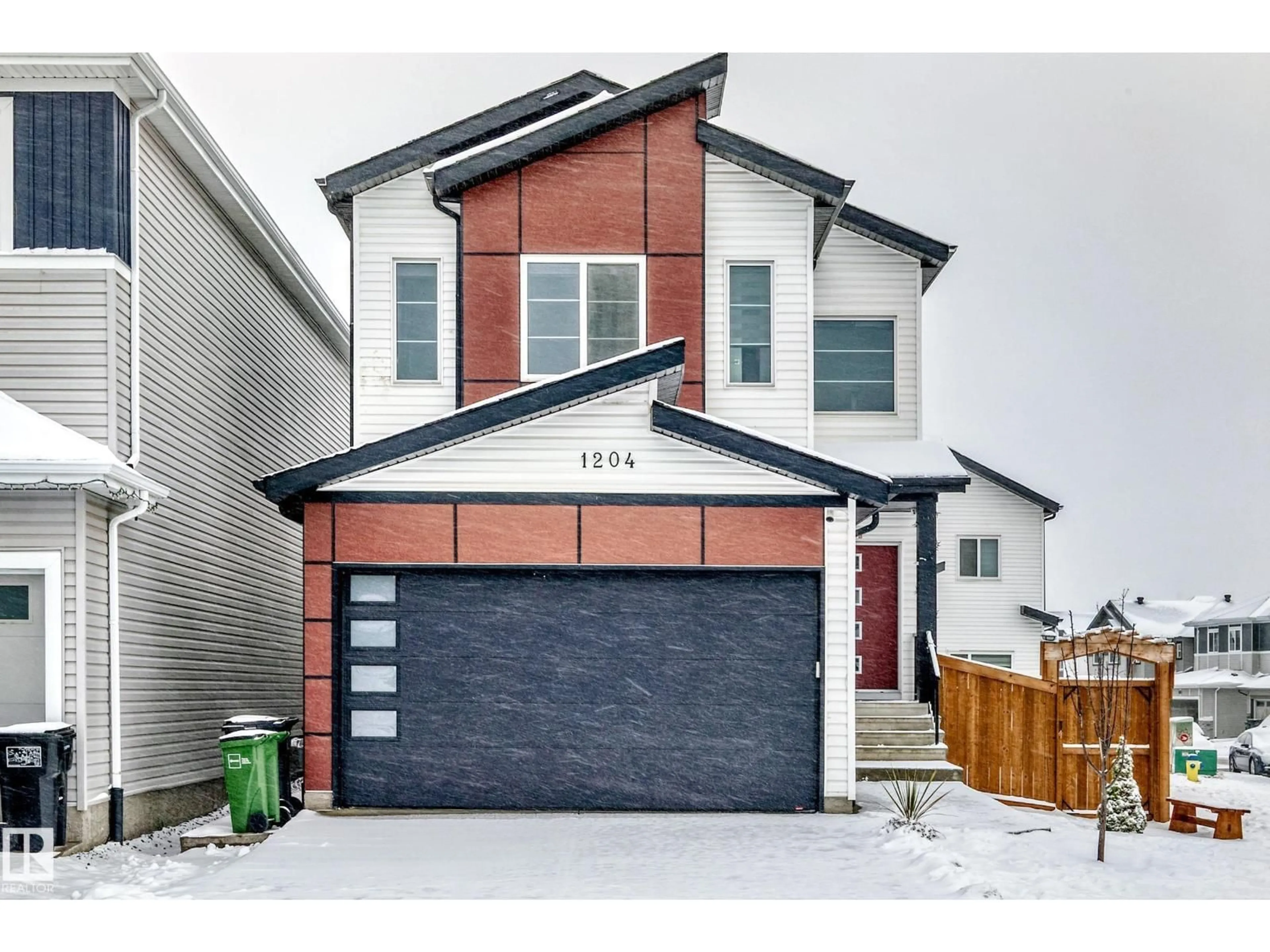 Home with brick exterior material, street for 1204 13 AV, Edmonton Alberta T6T2W2