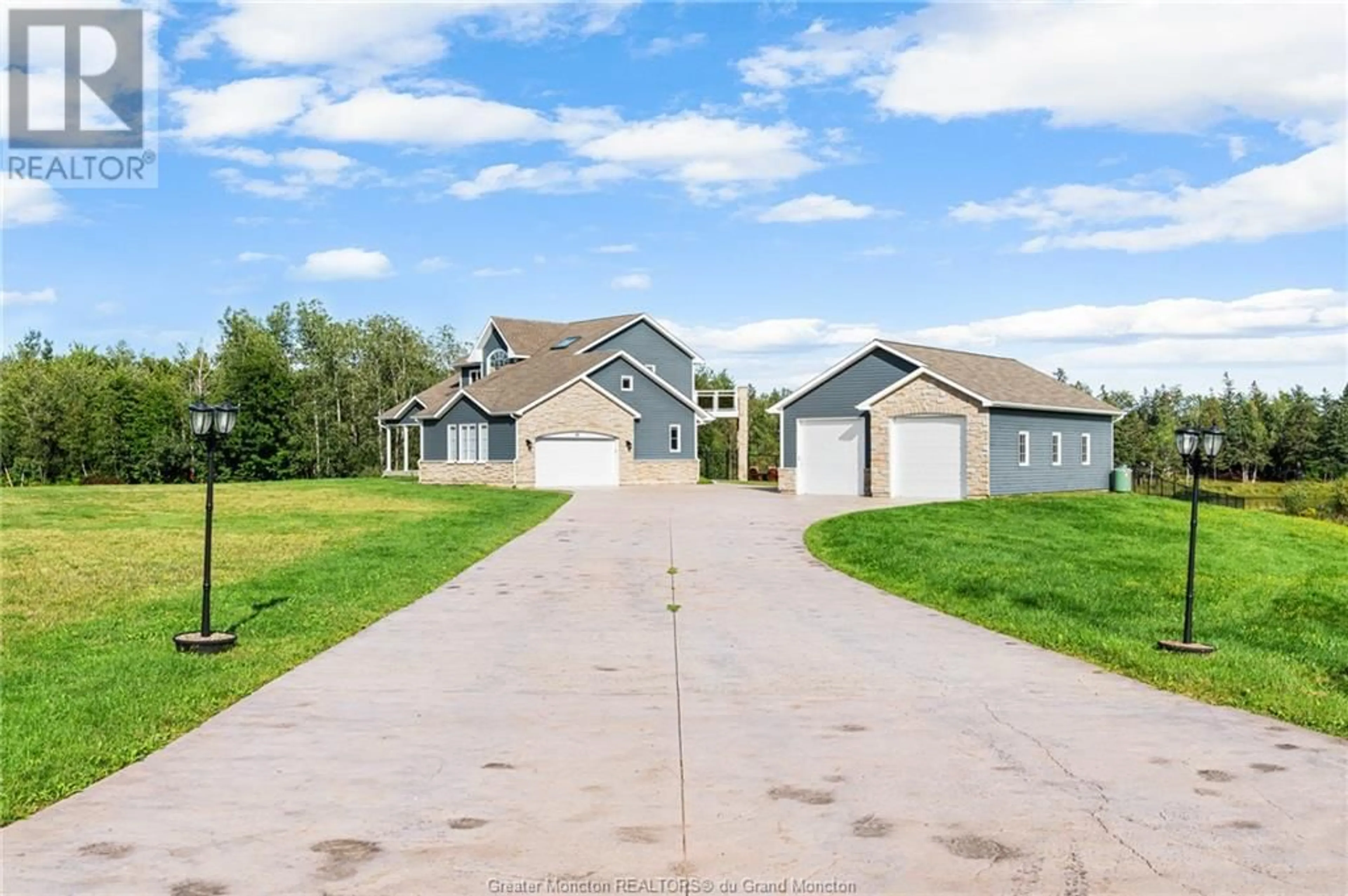 Frontside or backside of a home for 35 Beaumont RD, Grand-Barachois New Brunswick E4P0C1