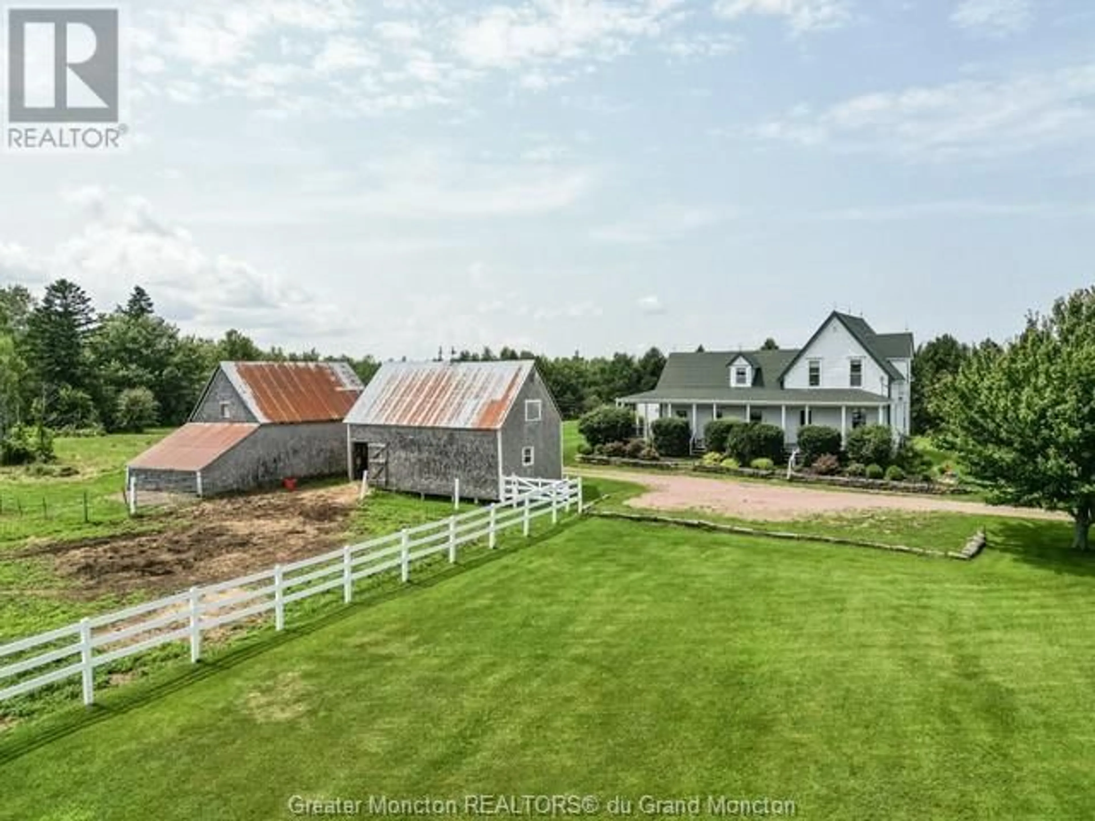 Frontside or backside of a home, the fenced backyard for 872 Route 955, Murray Corner New Brunswick E4M3L2