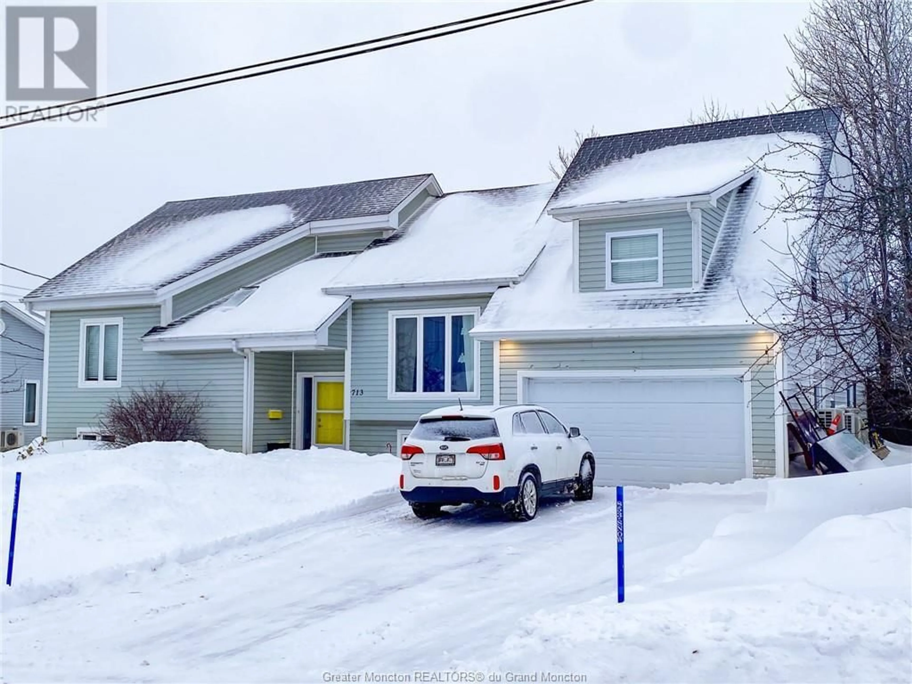 Home with stucco exterior material for 713 Boudreau, Dieppe New Brunswick E1A6X5