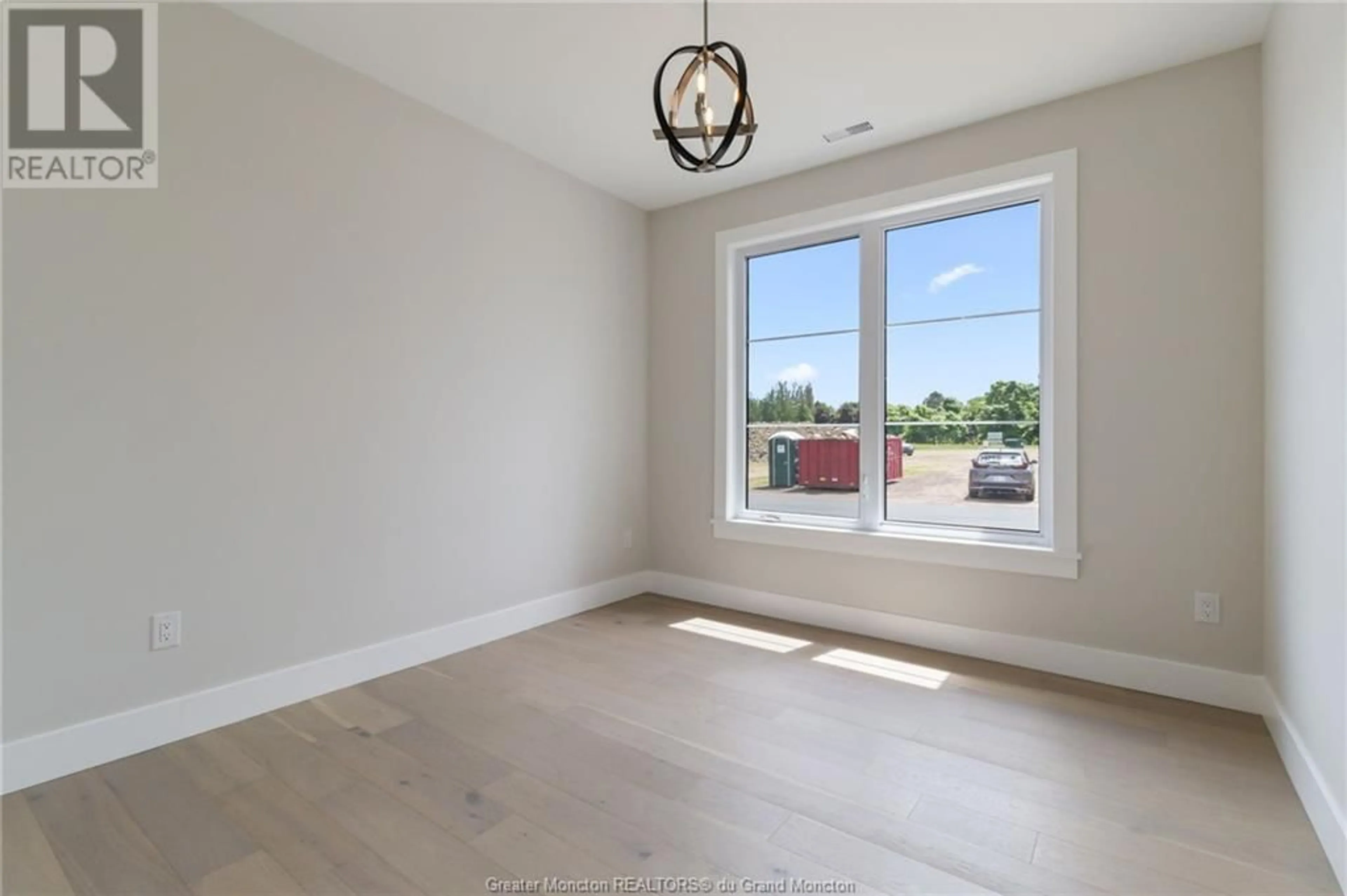 A pic of a room, wood floors for 724 Route 133 Unit# 116, Shediac New Brunswick E4P5A3