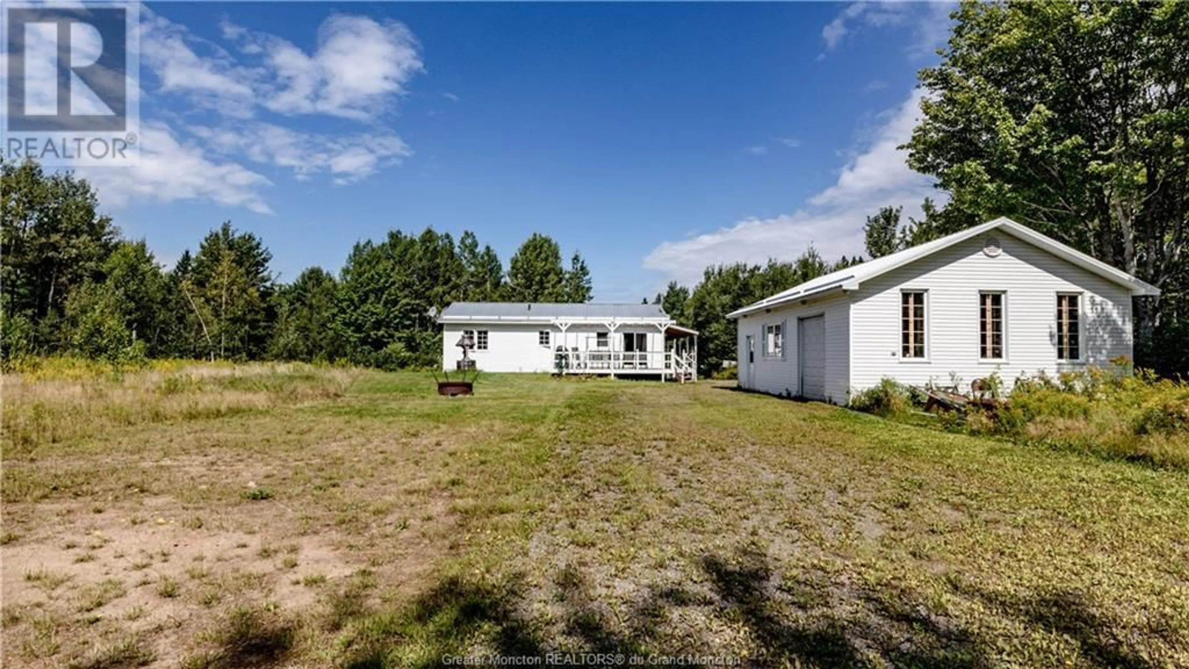 Frontside or backside of a home for 99 Pacific Gallant, Saint-Charles New Brunswick E4W4R2