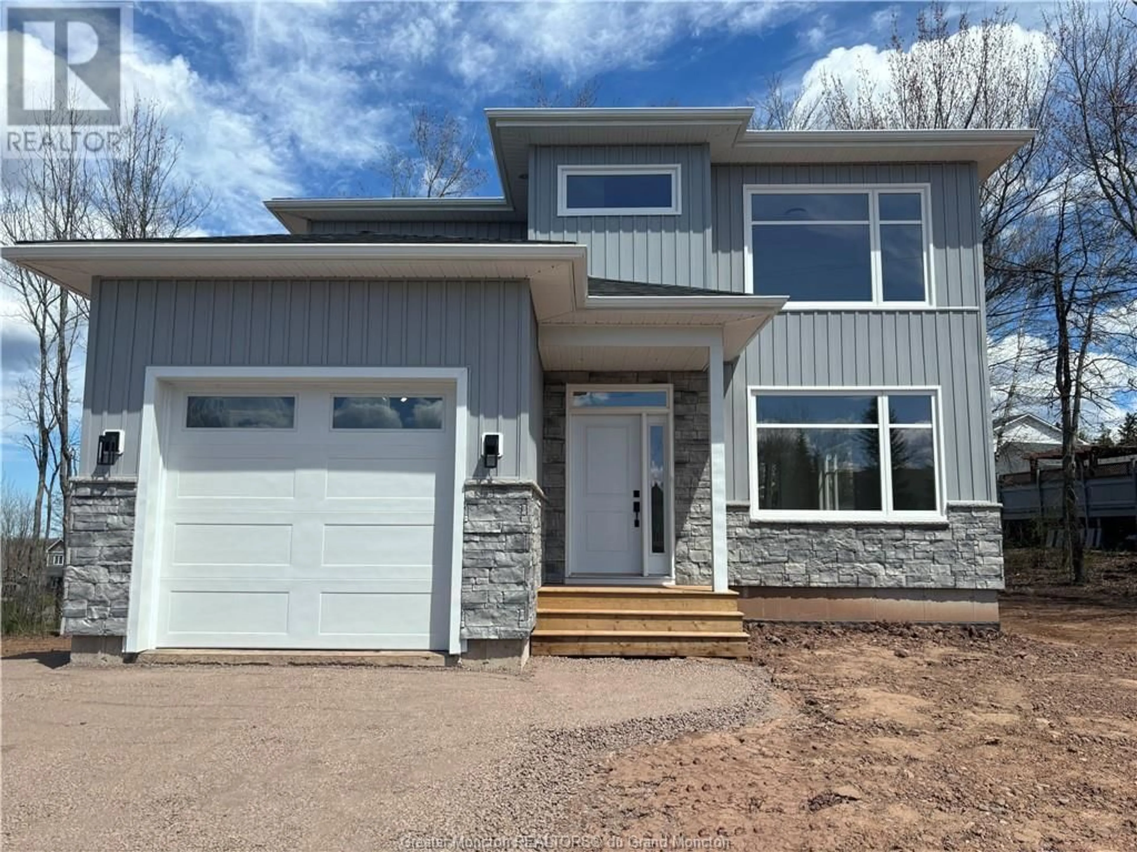 Home with vinyl exterior material for 145 Ripplewood RD, Moncton New Brunswick E1A2A7