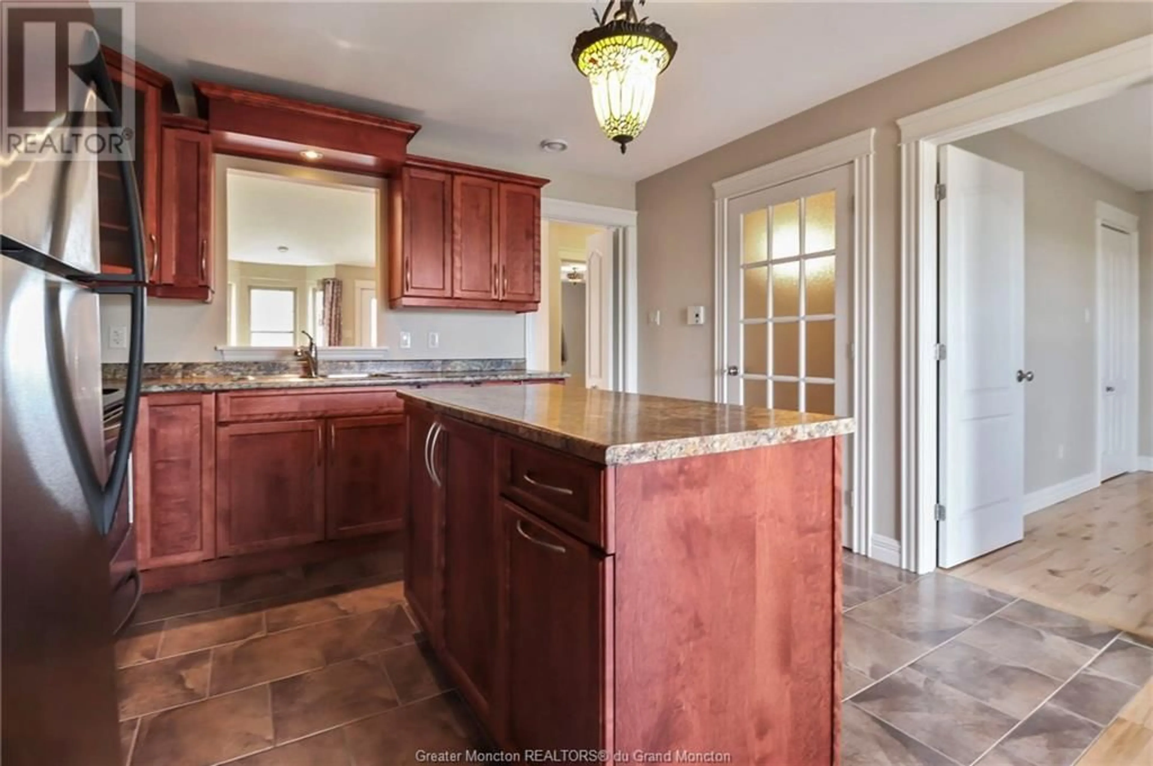 Open concept kitchen for 80 Lakeburn Avenue, Dieppe New Brunswick E1A0Y7