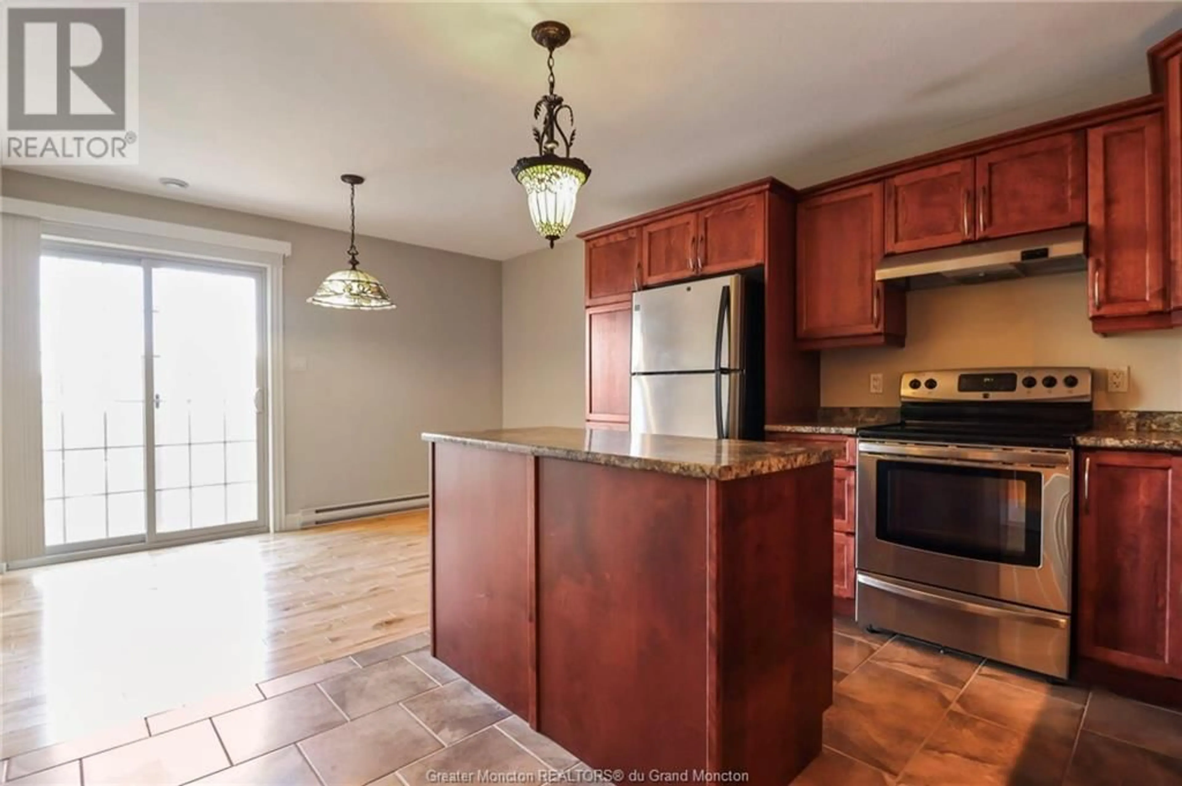 Open concept kitchen for 80 Lakeburn Avenue, Dieppe New Brunswick E1A0Y7