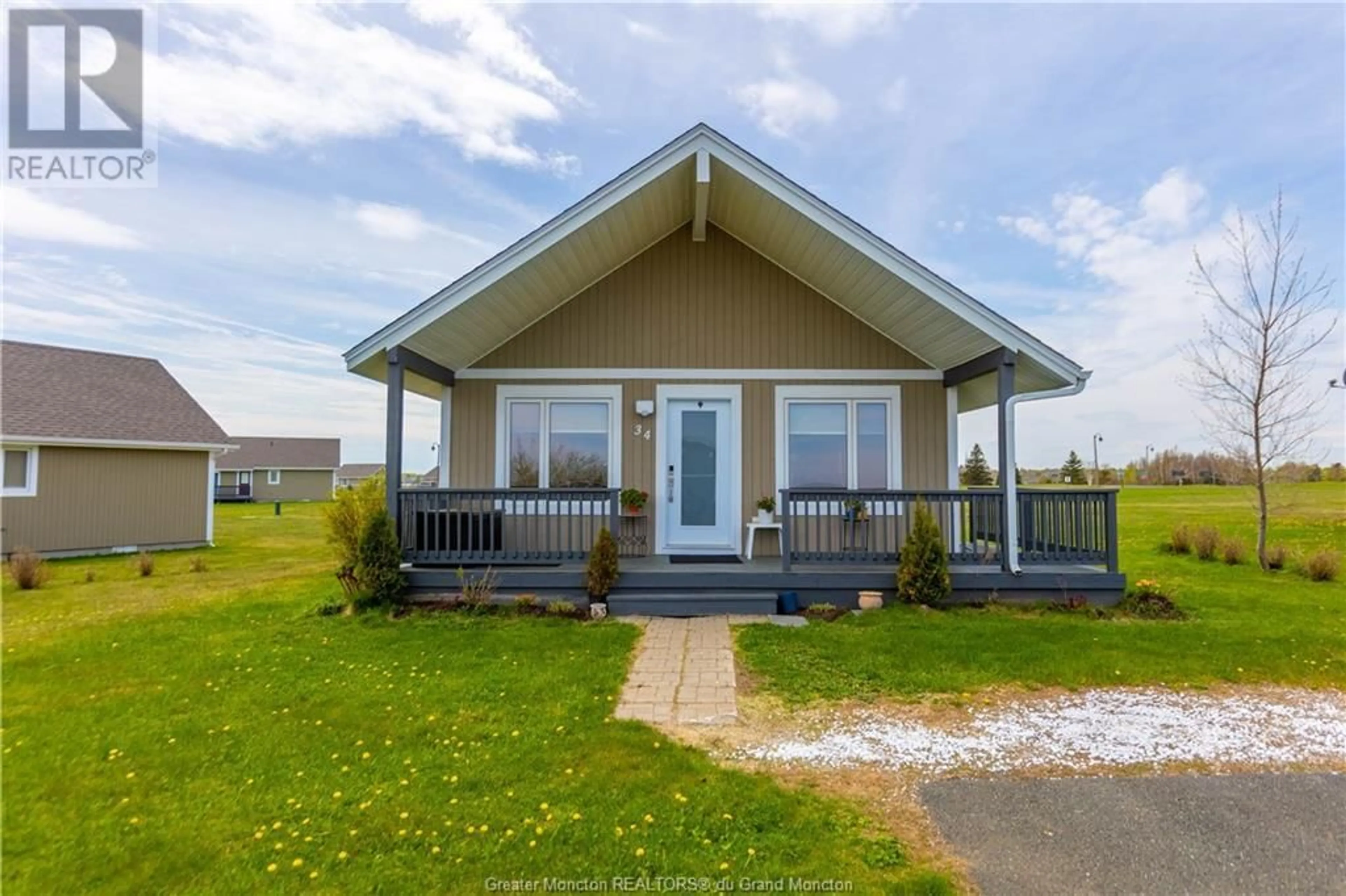 Frontside or backside of a home for 34 La Dune, Tracadie-Sheila New Brunswick E1X4S9