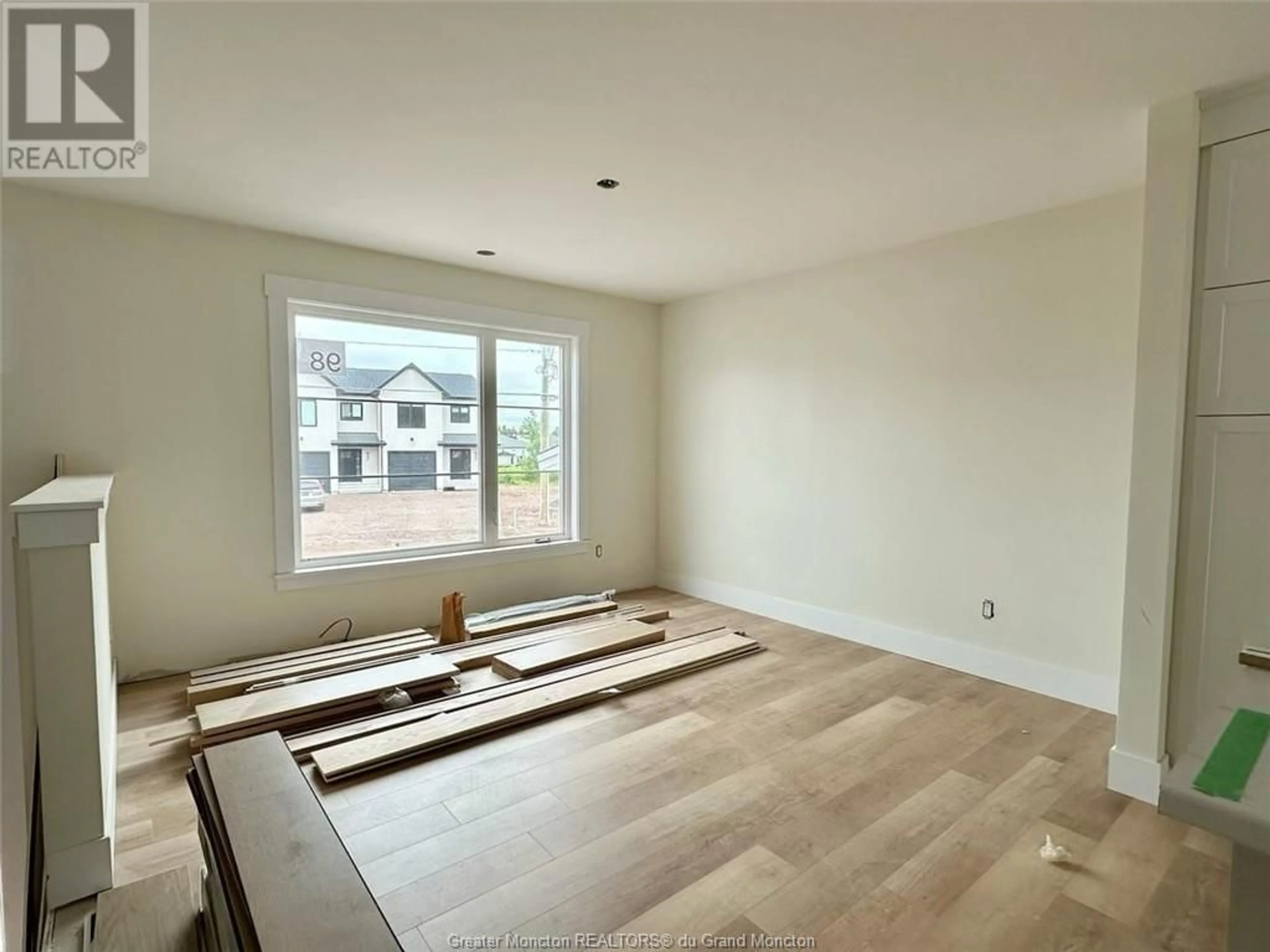 A pic of a room, wood floors for 102 Ernest Street, Dieppe New Brunswick E1A4T2