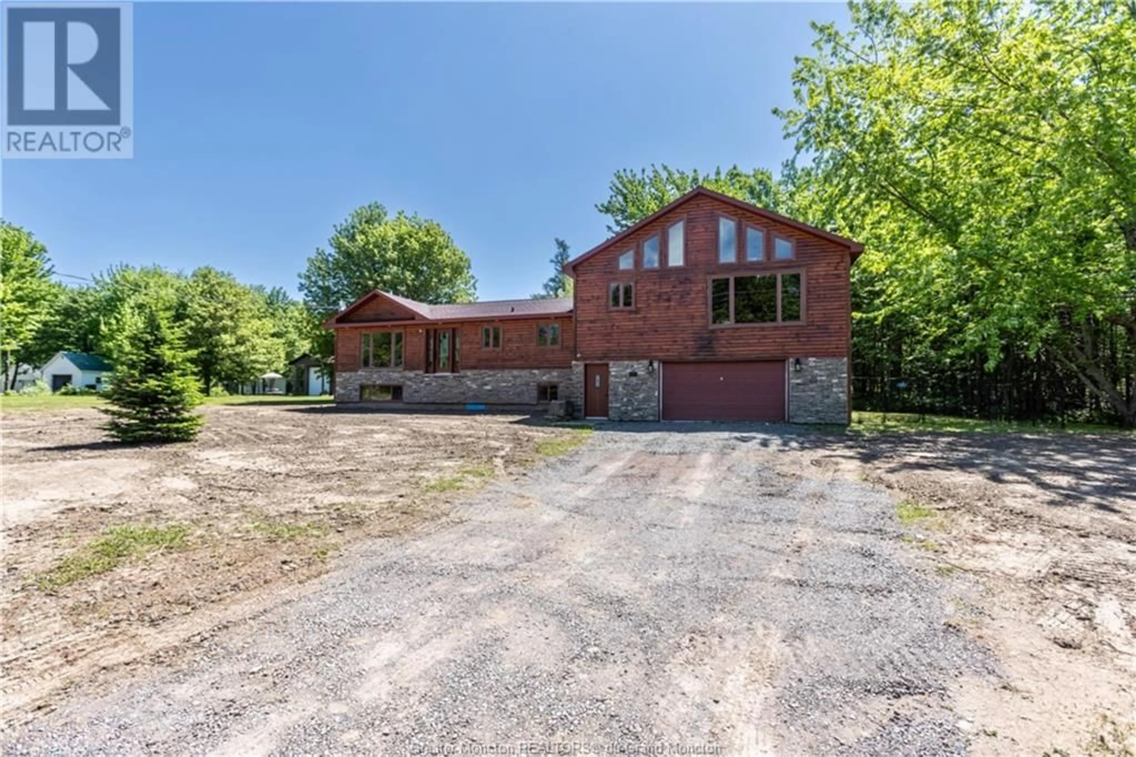 Frontside or backside of a home for 245 Cape Breton RD, Irishtown New Brunswick E1H1W7