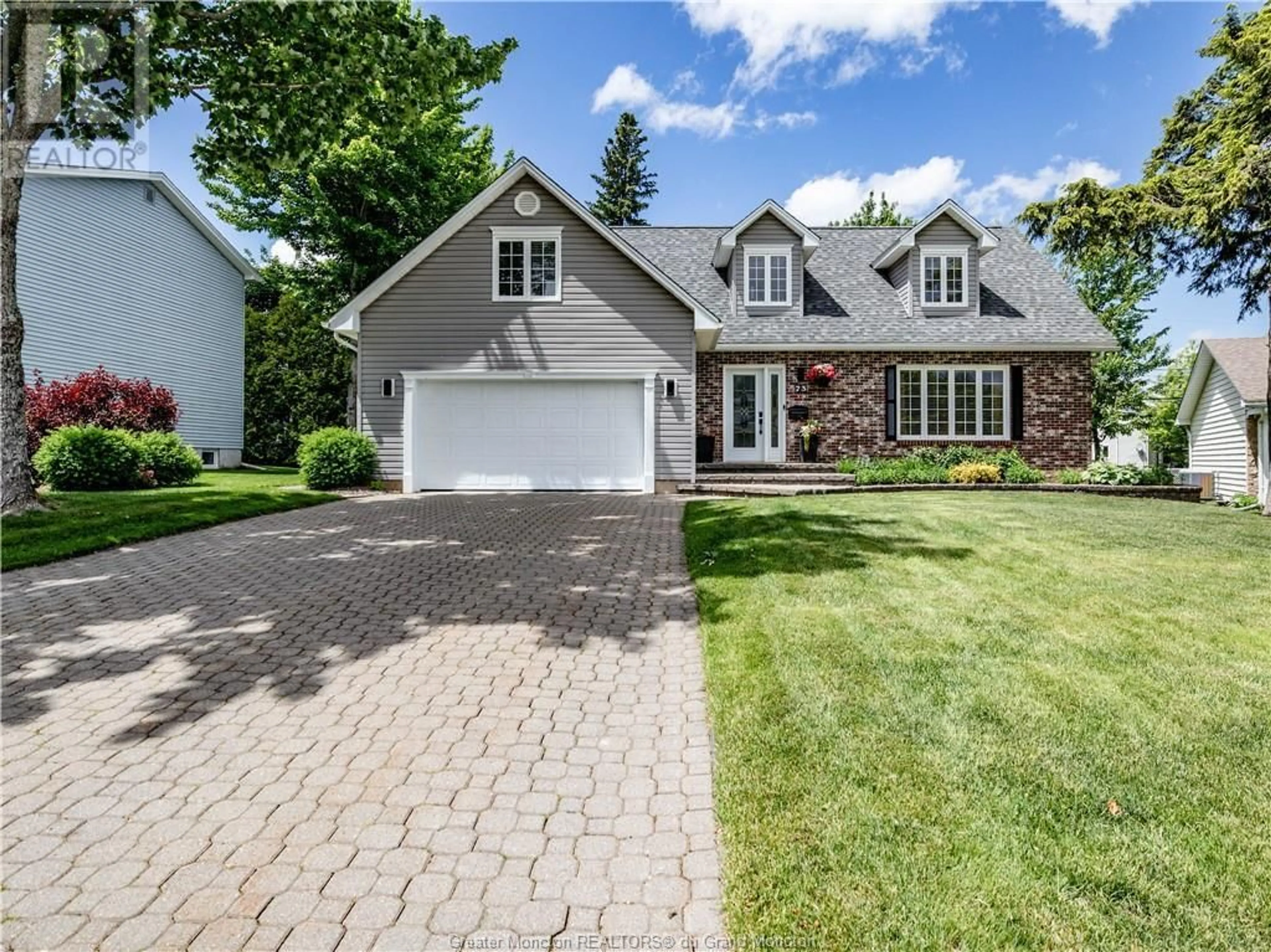 Home with brick exterior material for 73 Teakwood, Moncton New Brunswick E1G1T3