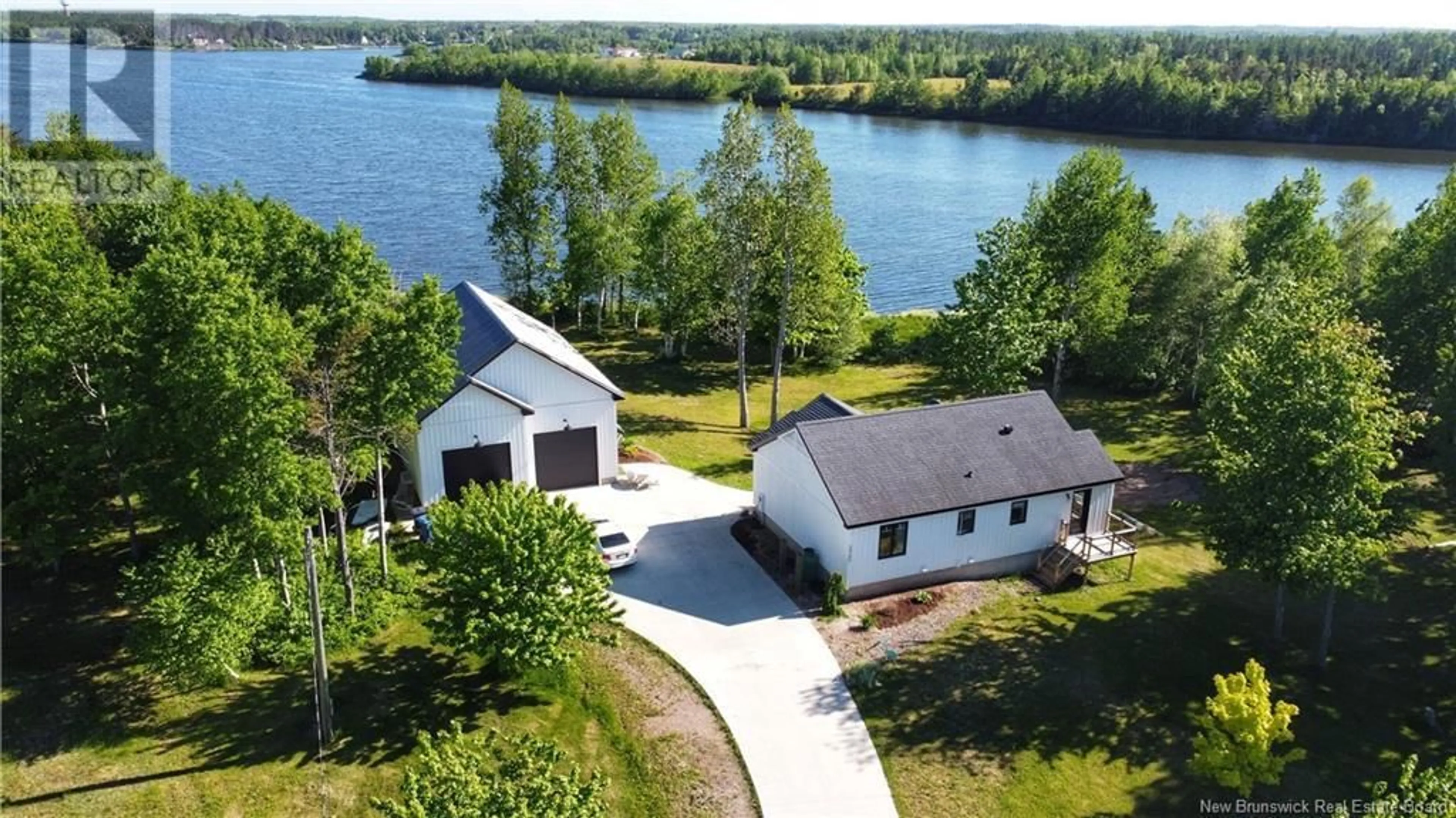 A pic from outside/outdoor area/front of a property/back of a property/a pic from drone, water/lake/river/ocean view for 2765 CARRIE, Tracadie New Brunswick E1X1A2