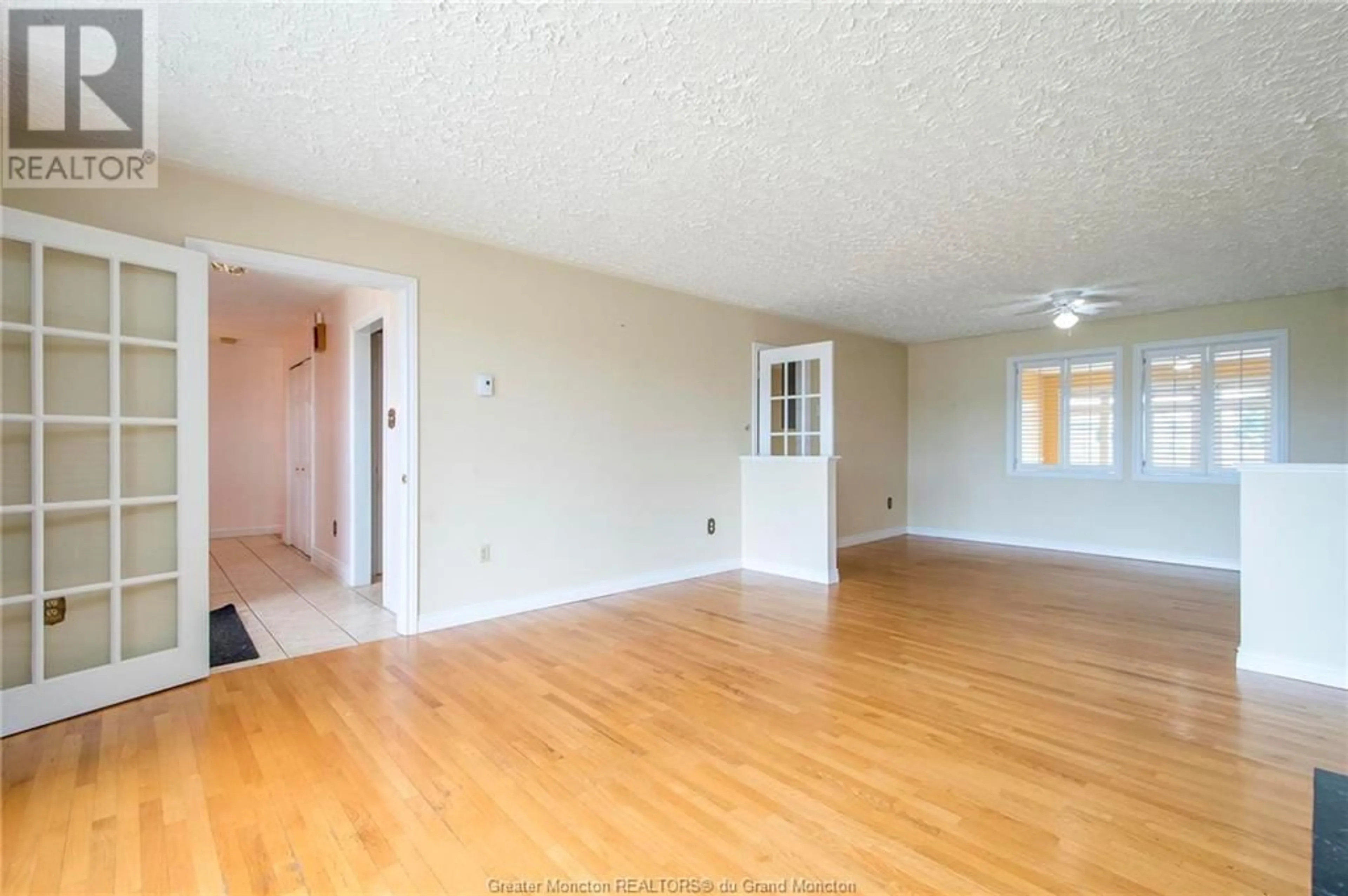 A pic of a room, wood floors for 21 Richard Avenue, Bouctouche New Brunswick E4S3T1