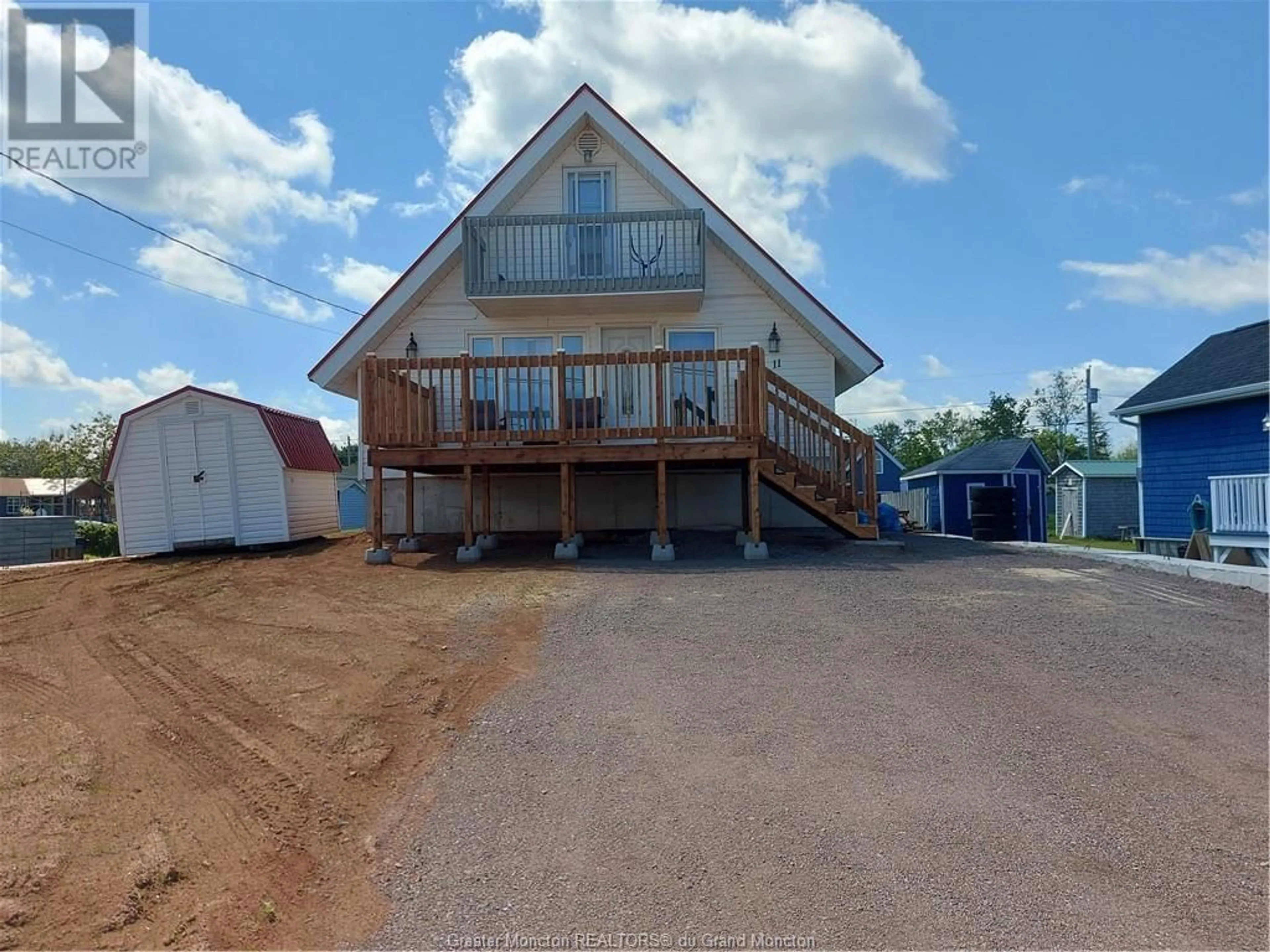 Frontside or backside of a home for 11 Sur L' Ocean, Grand-Barachois New Brunswick E4P8N9