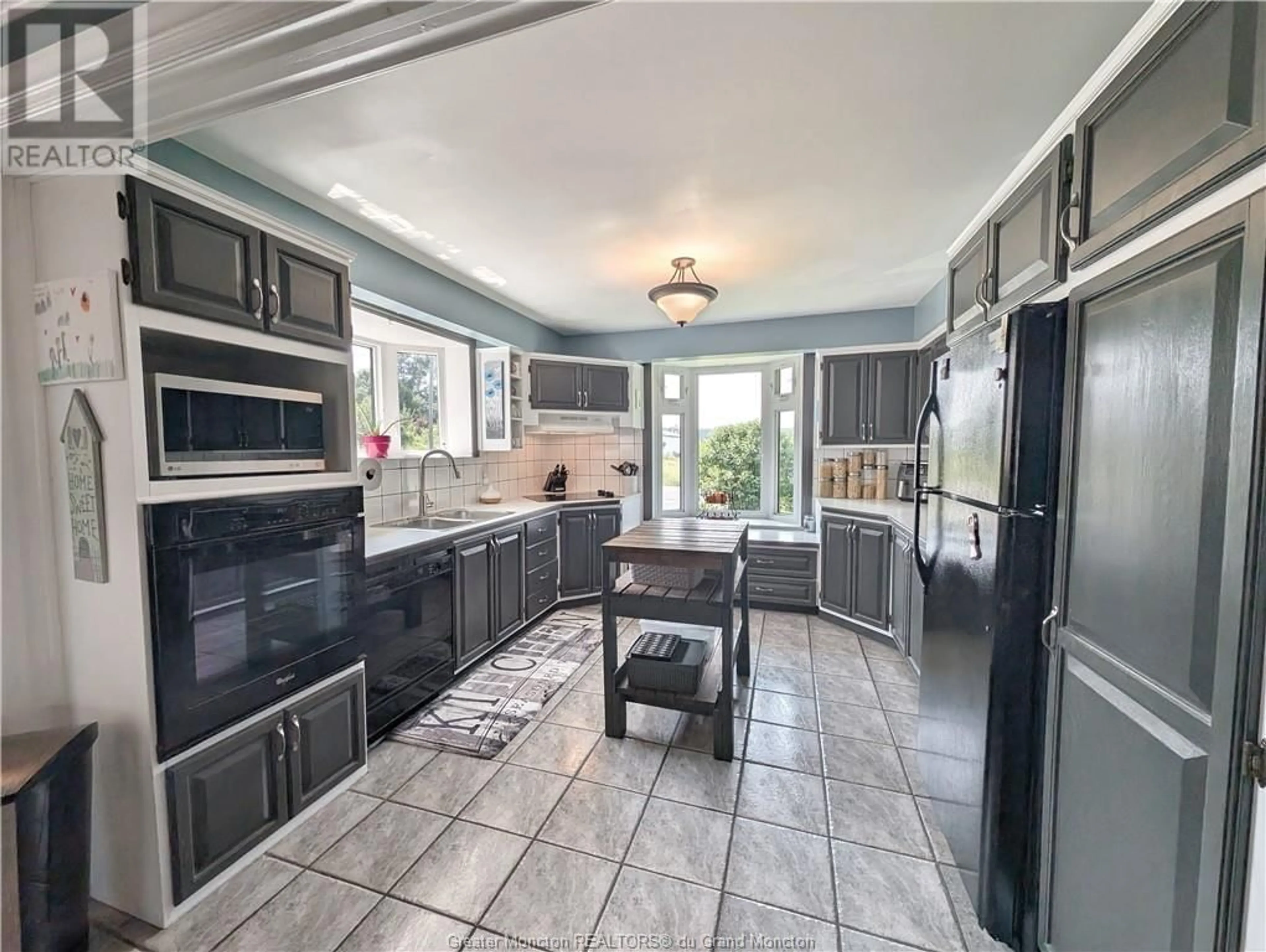 Open concept kitchen for 8 Pat Carney Road, Black Point New Brunswick E8G1R7