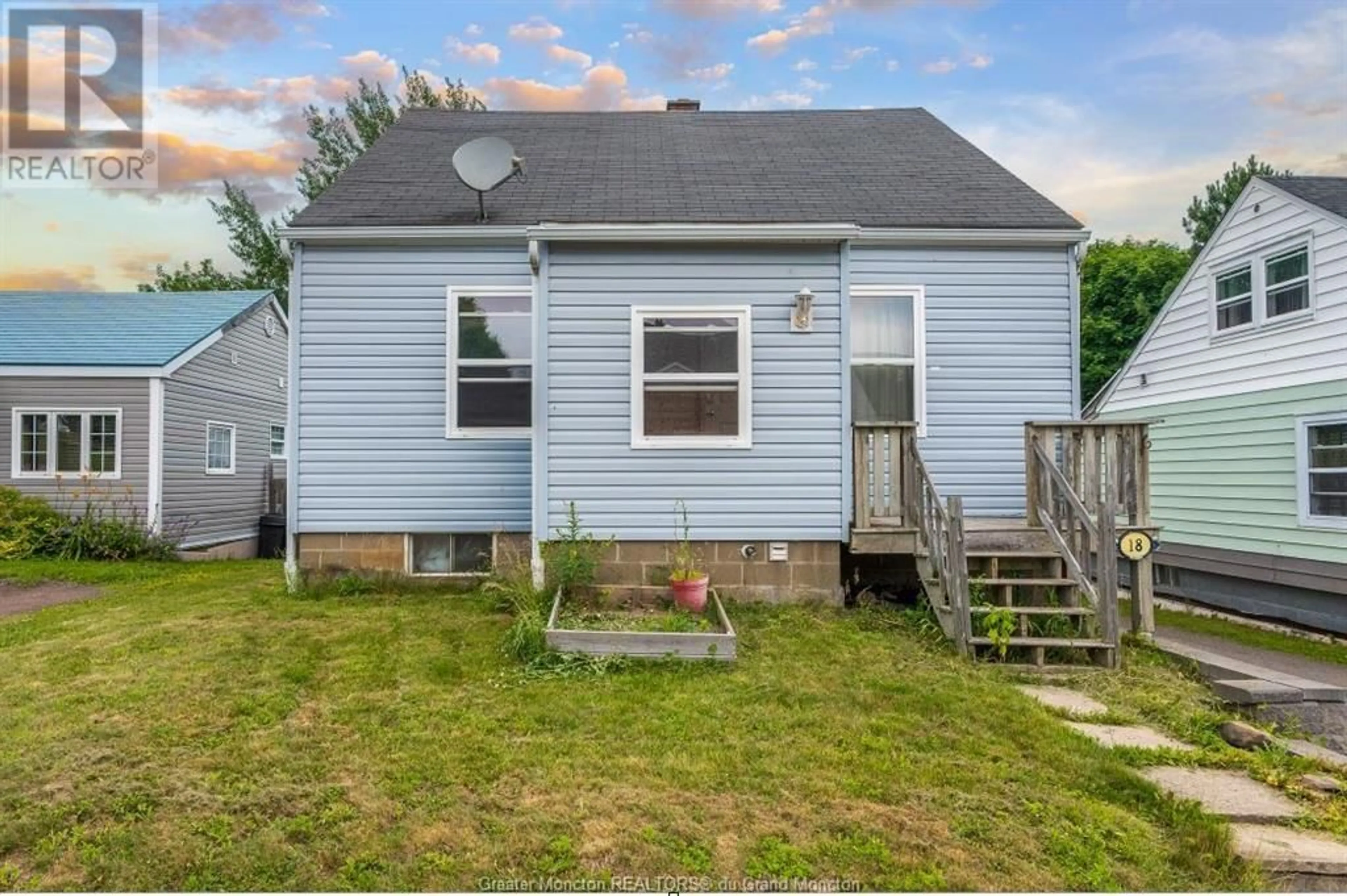 Frontside or backside of a home, the fenced backyard for 18 Tower Drive, Dieppe New Brunswick E1A2G5