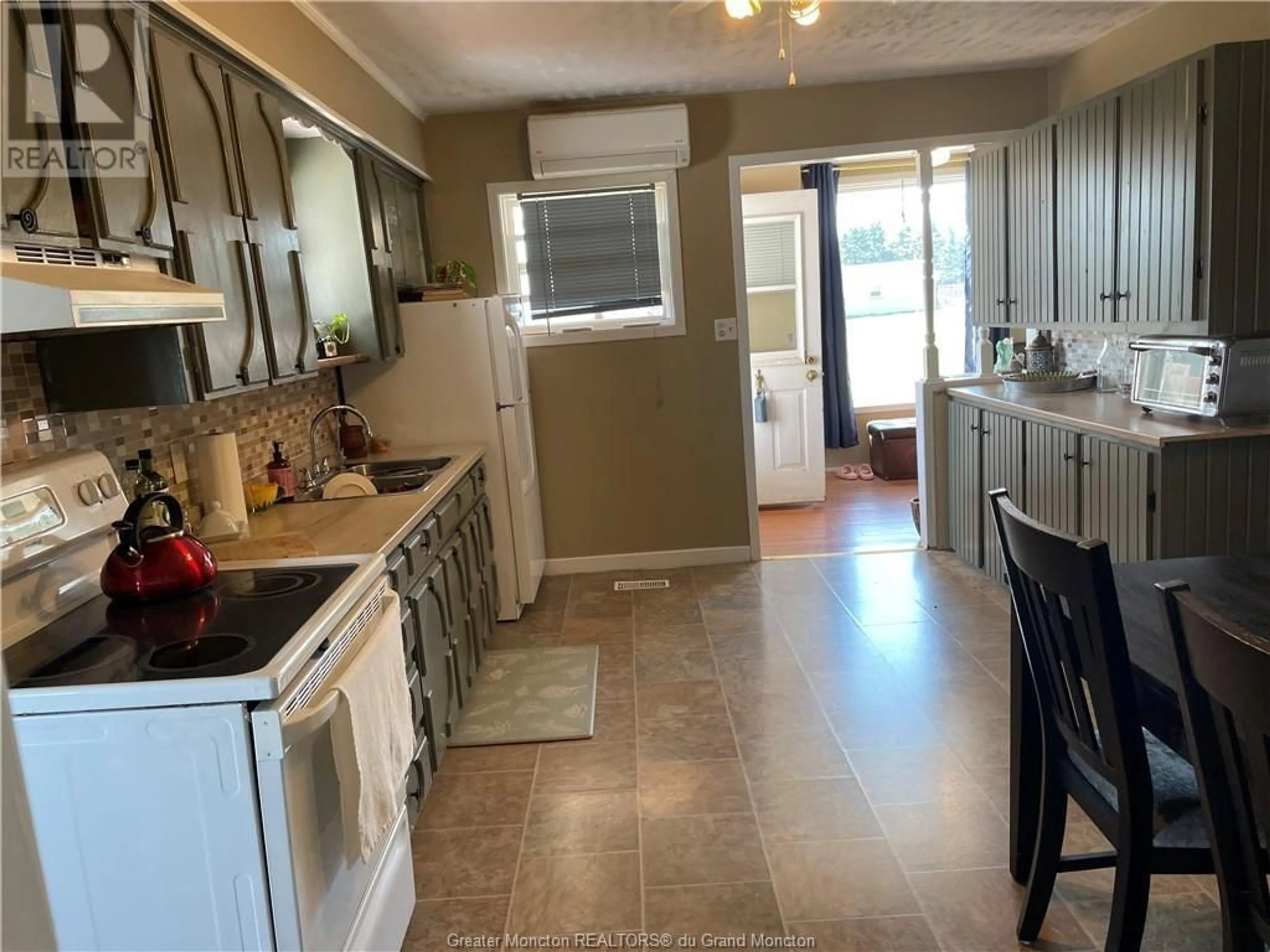 Kitchen, wood floors, cottage for 99 Cap Lumiere Road, Richibouctou-Village New Brunswick E4W1C8