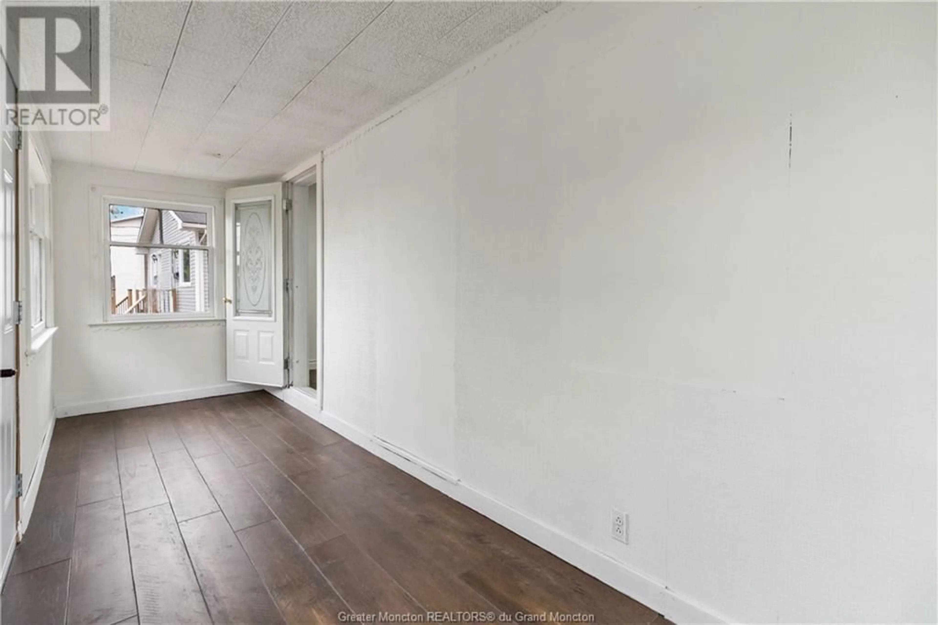 A pic of a room, wood floors for 18 Second Avenue, Moncton New Brunswick E1C5H2