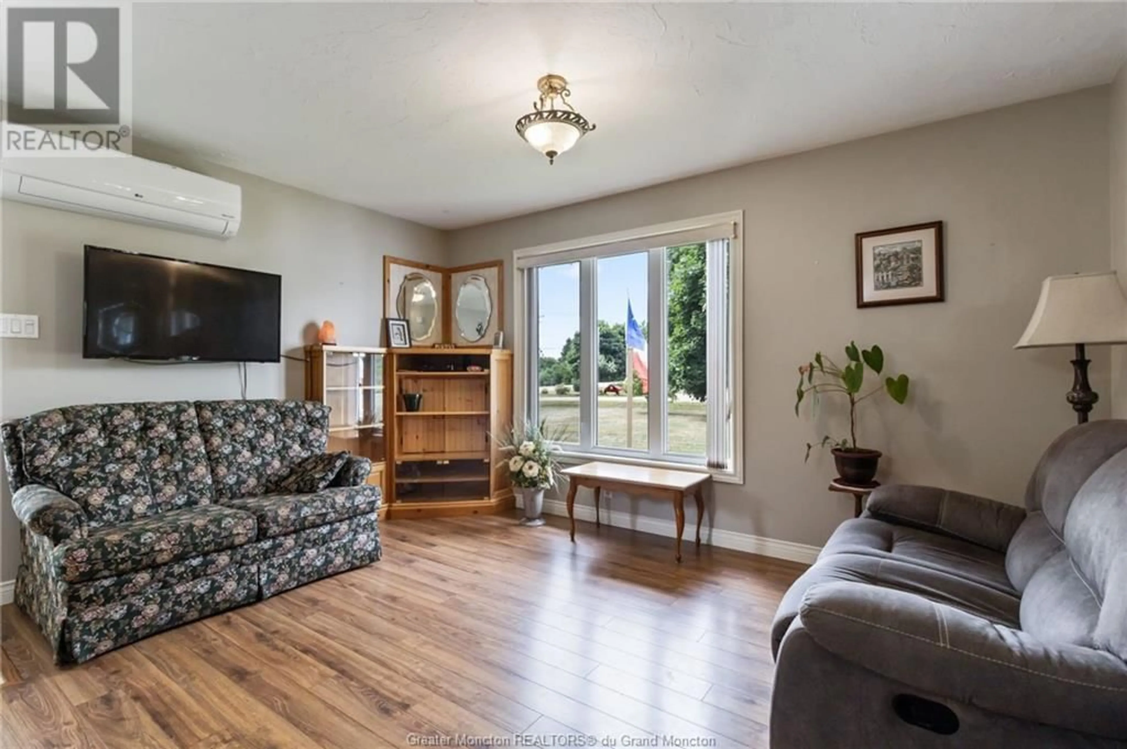 Living room, wood floors for 132 Du Couvent Road, Bouctouche New Brunswick E4S3C1