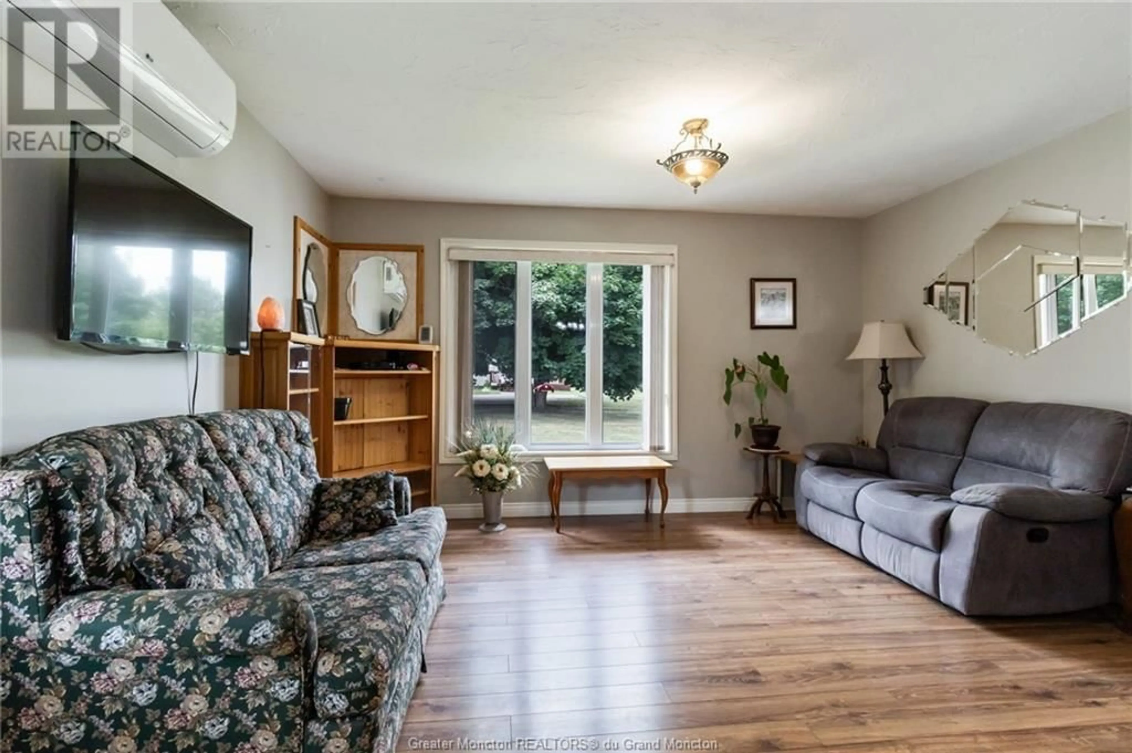 Living room, wood floors for 132 Du Couvent Road, Bouctouche New Brunswick E4S3C1