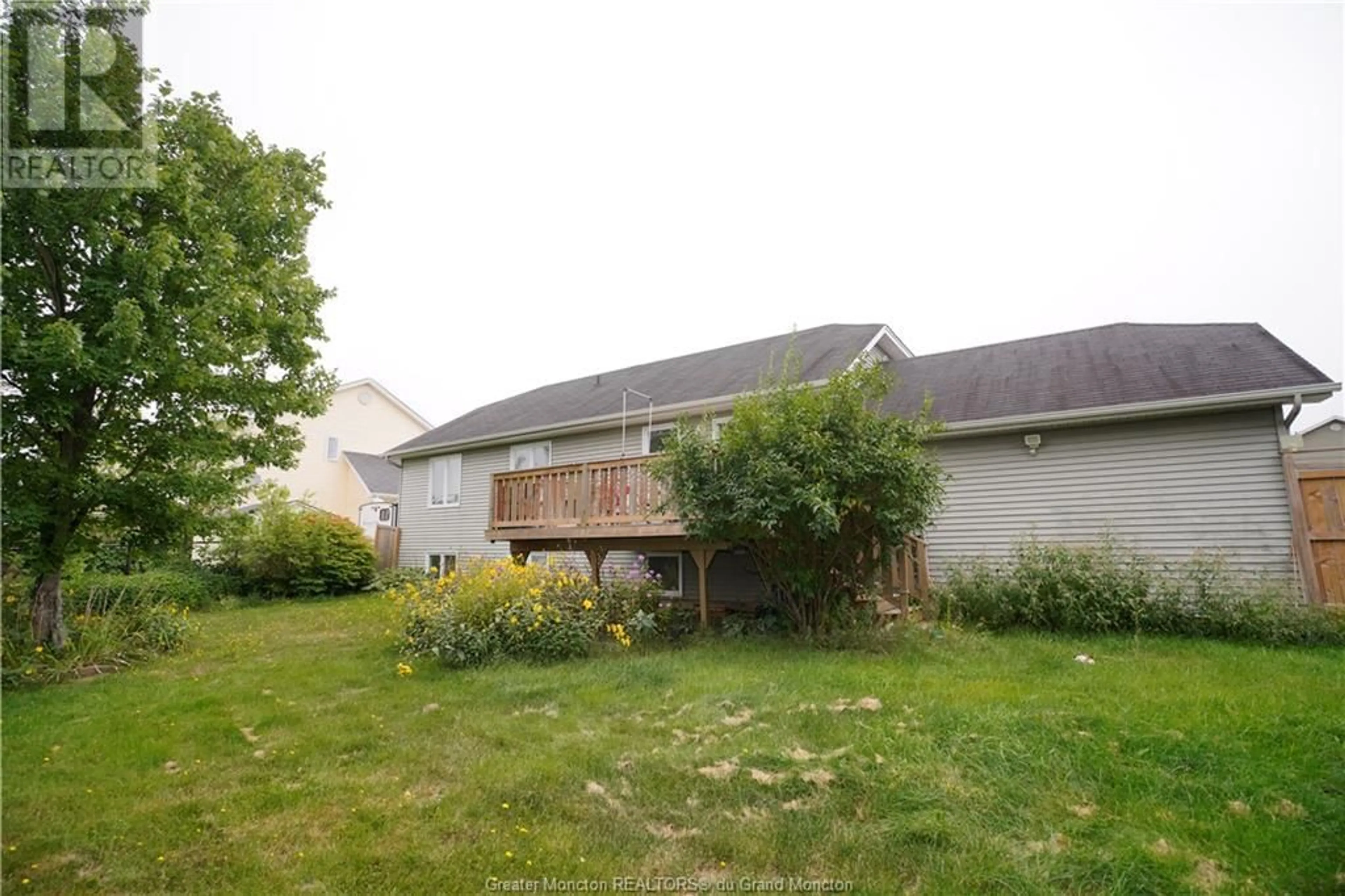 Frontside or backside of a home, the fenced backyard for 363 Rennick Road, Moncton New Brunswick E1G5G9