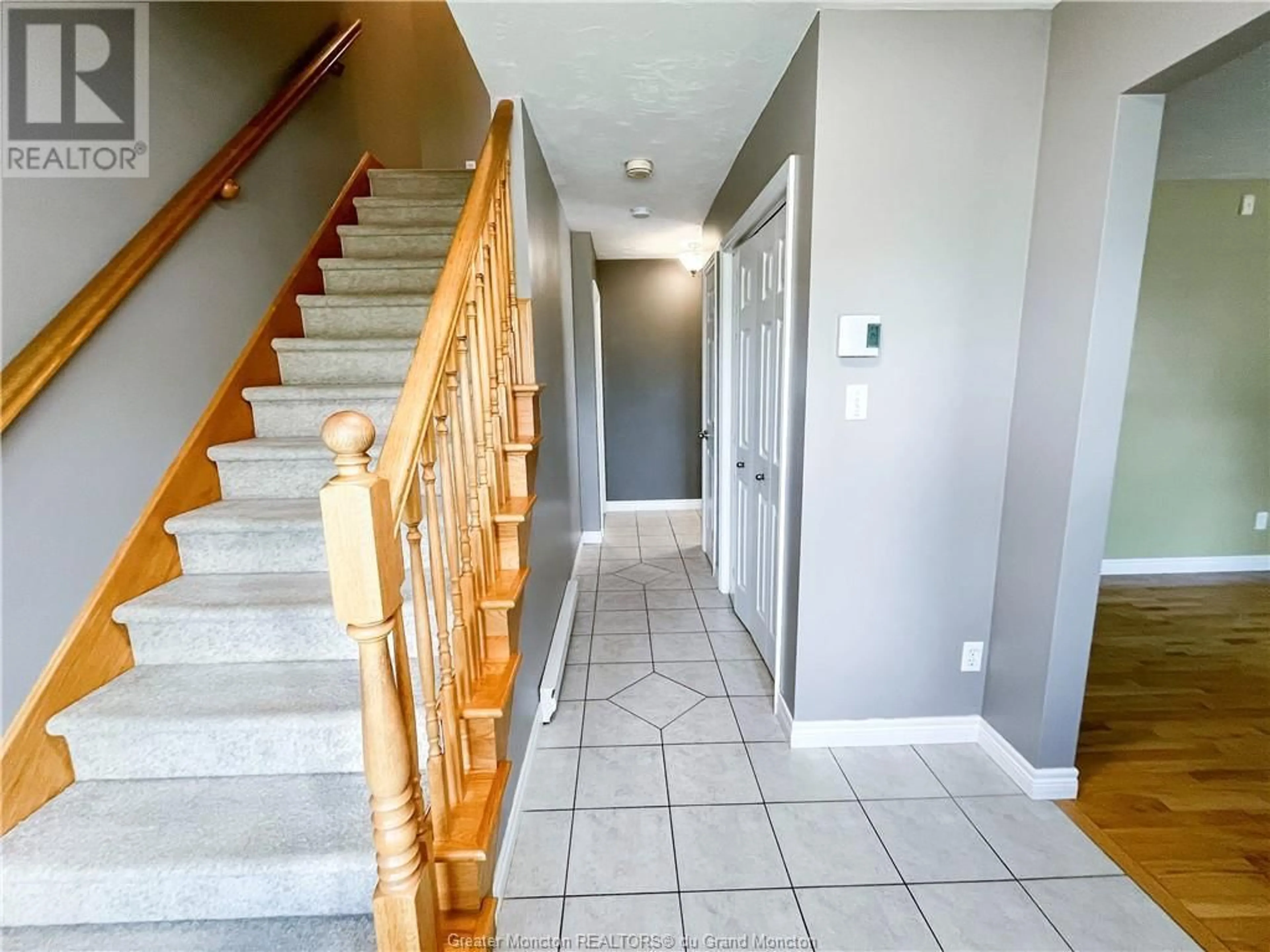 Indoor foyer, wood floors for 64 McAndrew Street, Moncton New Brunswick E1G4Z3