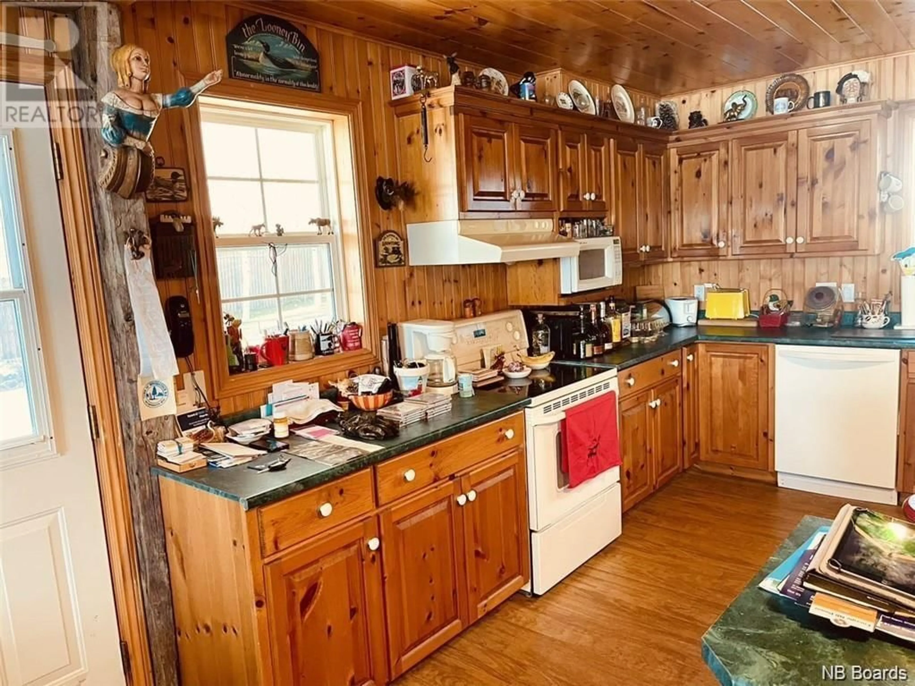 Kitchen, wood floors, cottage for 2179 Clark Road, Skiff Lake New Brunswick E6M1R1