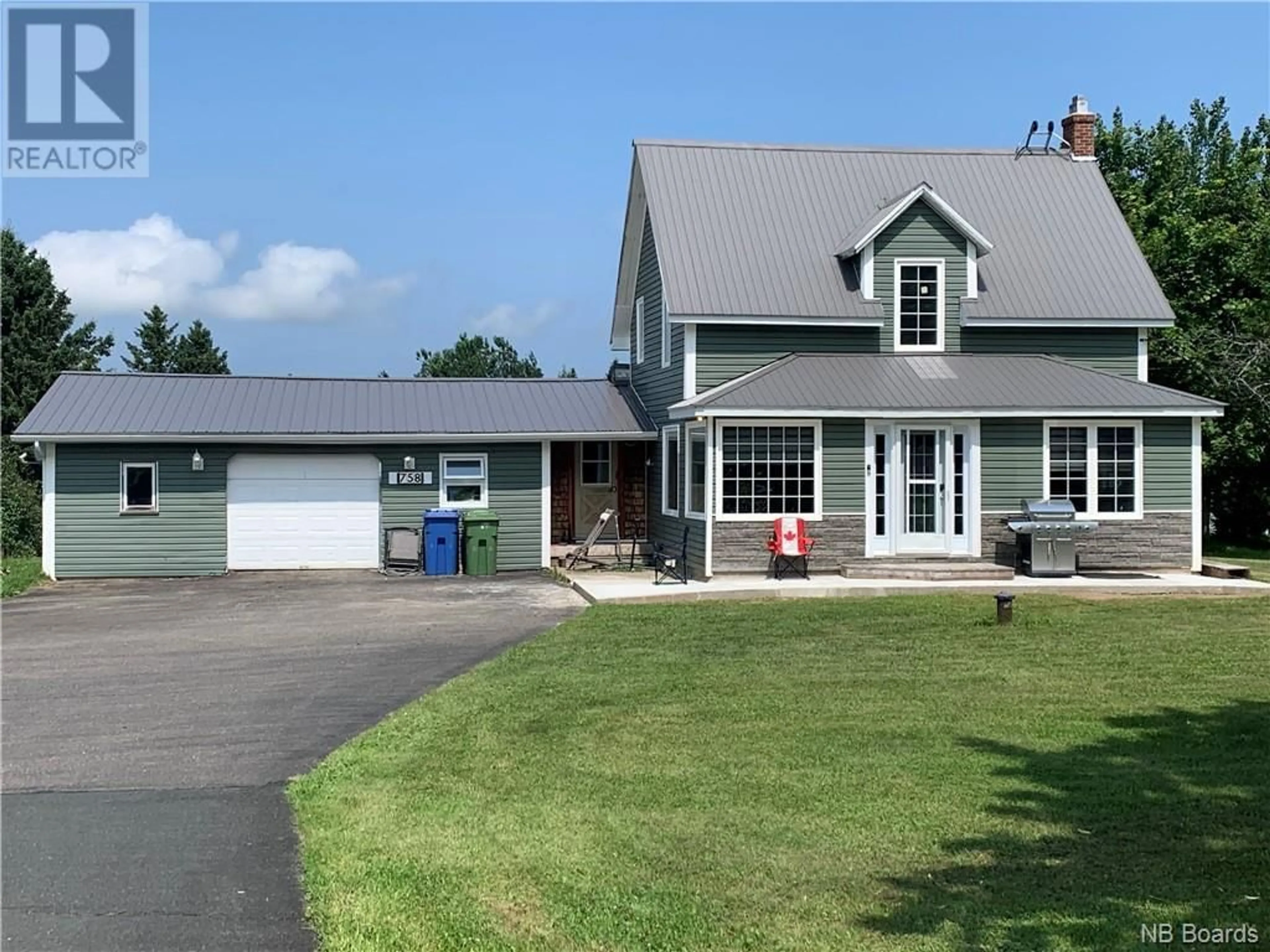 Home with vinyl exterior material for 758 Blvd des Acadiens, Bertrand New Brunswick E1W1G8