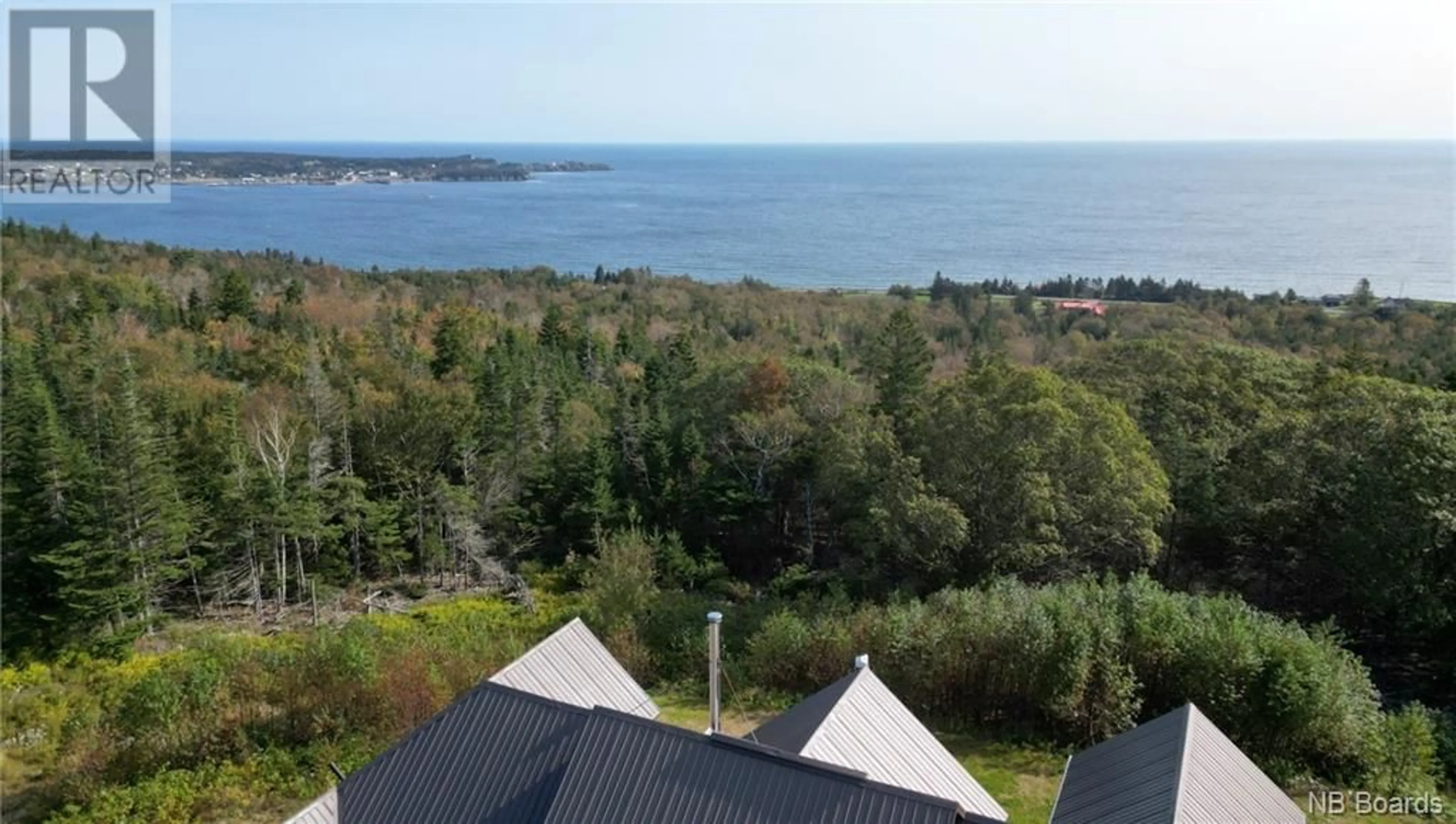 A pic from outside/outdoor area/front of a property/back of a property/a pic from drone, water/lake/river/ocean view for 55 BAYVIEW HEIGHTS, Grand Manan New Brunswick E5G1C1