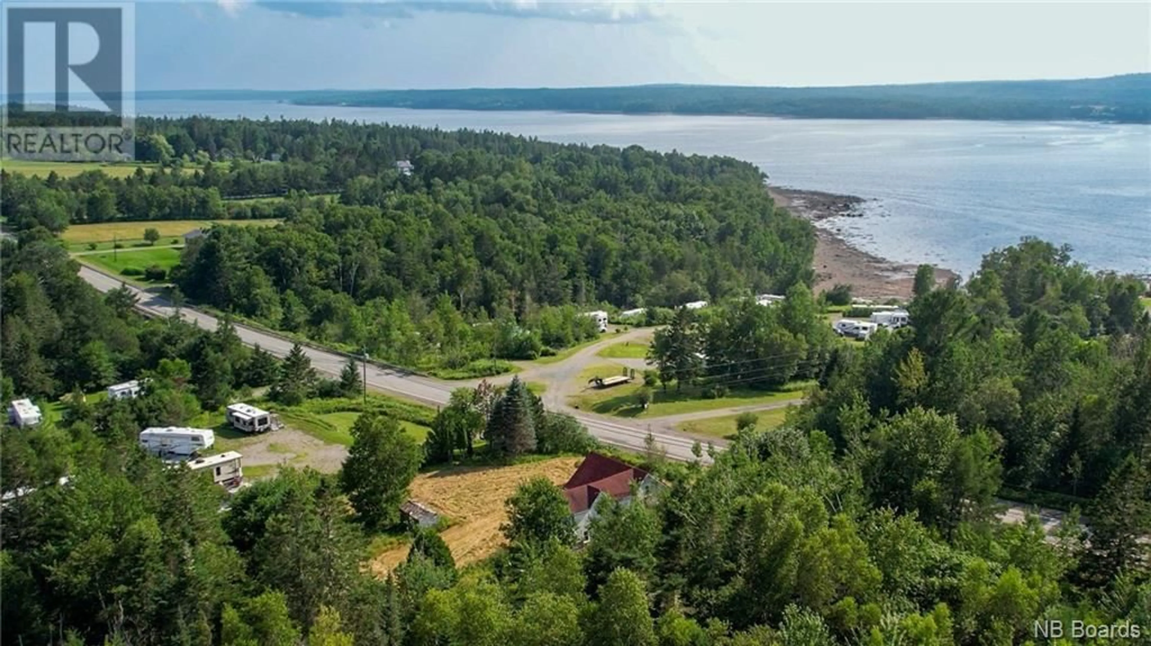 A pic from outside/outdoor area/front of a property/back of a property/a pic from drone, water/lake/river/ocean view for 3625 127 ROUTE, Bayside New Brunswick E5B2V3