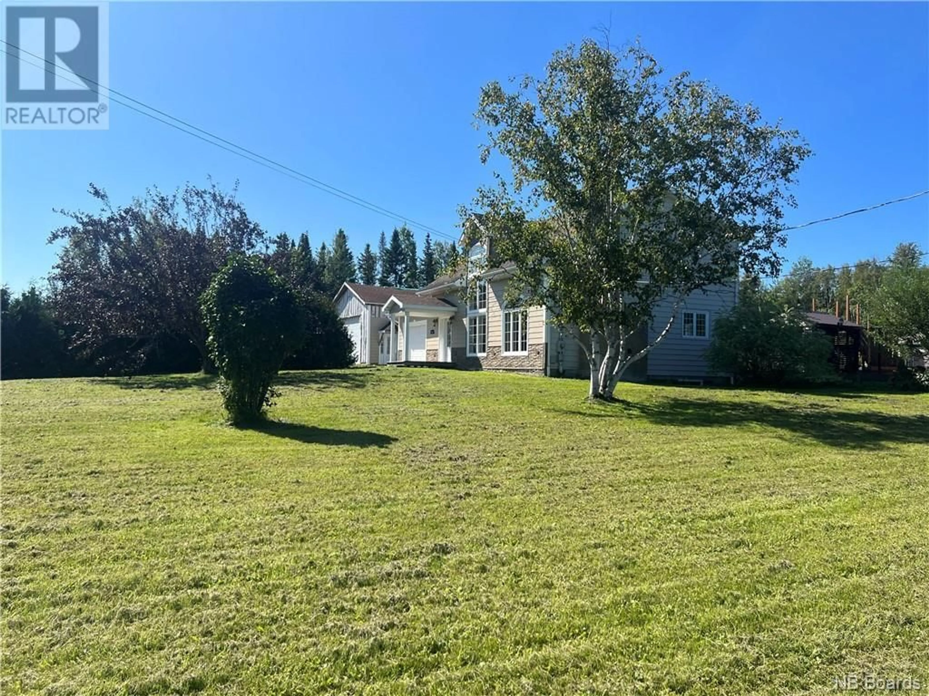 Frontside or backside of a home, cottage for 245 Rue Marcoux, Balmoral New Brunswick E8E1J3