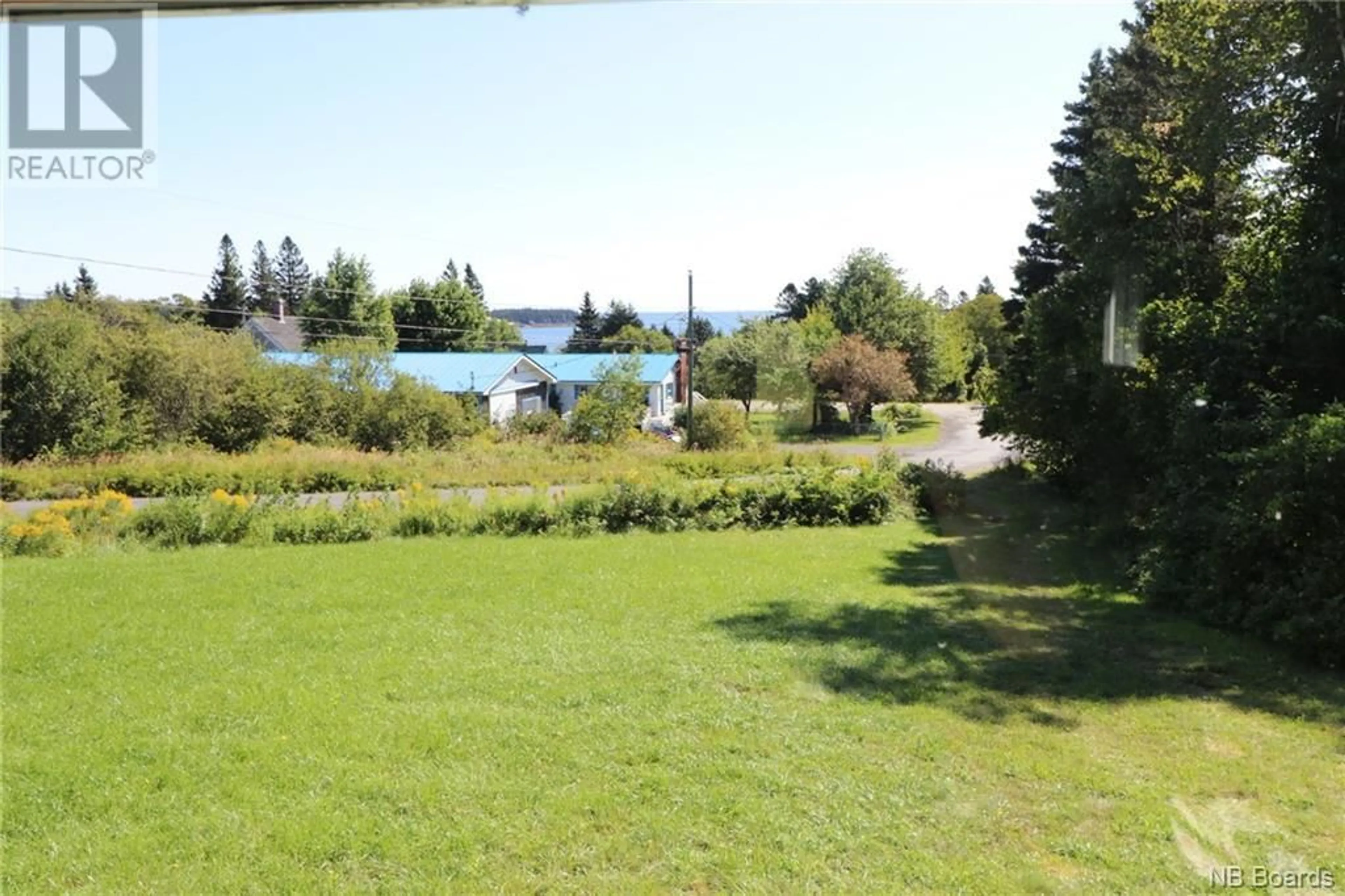 Patio, the fenced backyard for 7 Smiths Road, Grand Manan New Brunswick E5G2C1