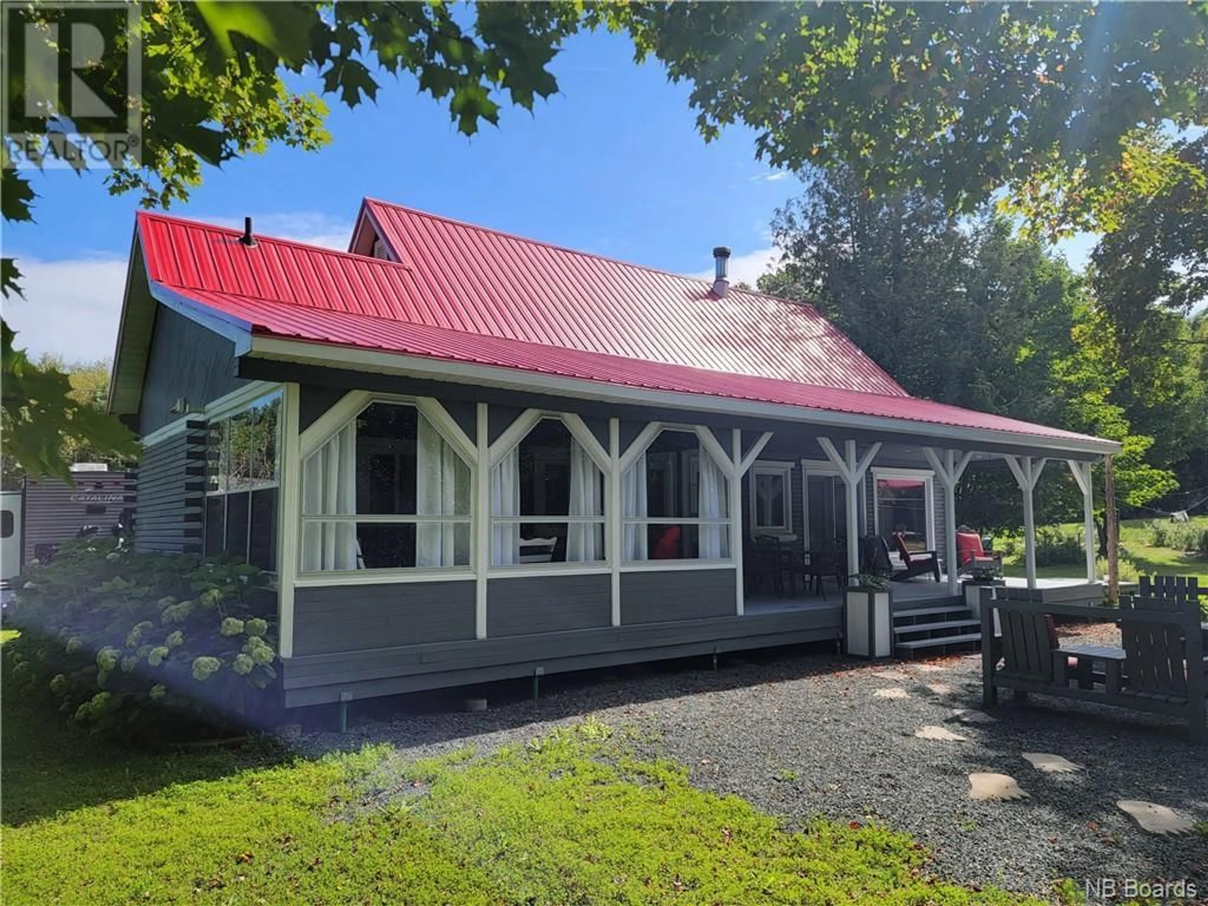 Home with vinyl exterior material for 34 Belle Rive Est, Robertville New Brunswick E8K2P8