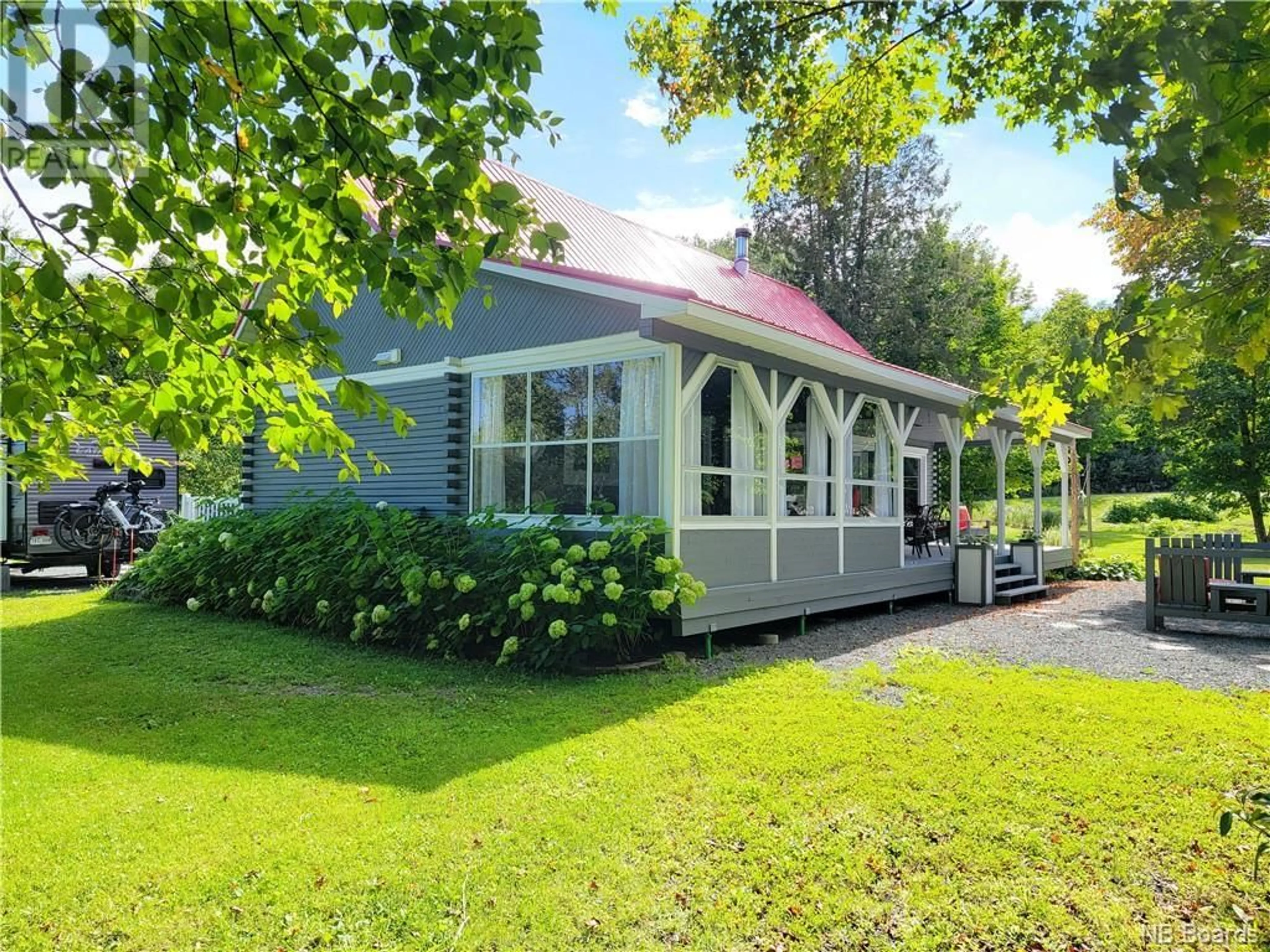 Frontside or backside of a home, cottage for 34 Belle Rive Est, Robertville New Brunswick E8K2P8