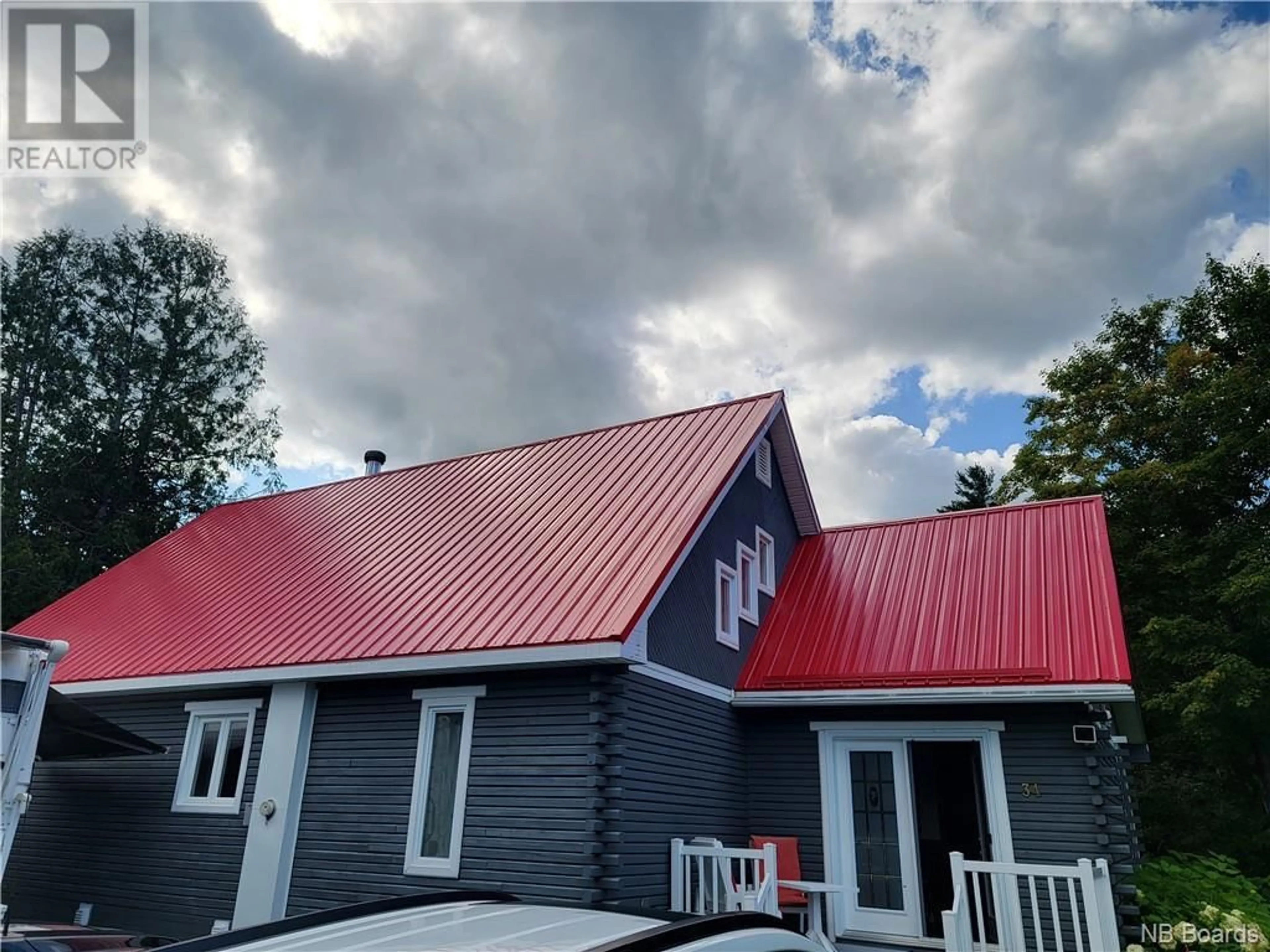 Home with vinyl exterior material for 34 Belle Rive Est, Robertville New Brunswick E8K2P8