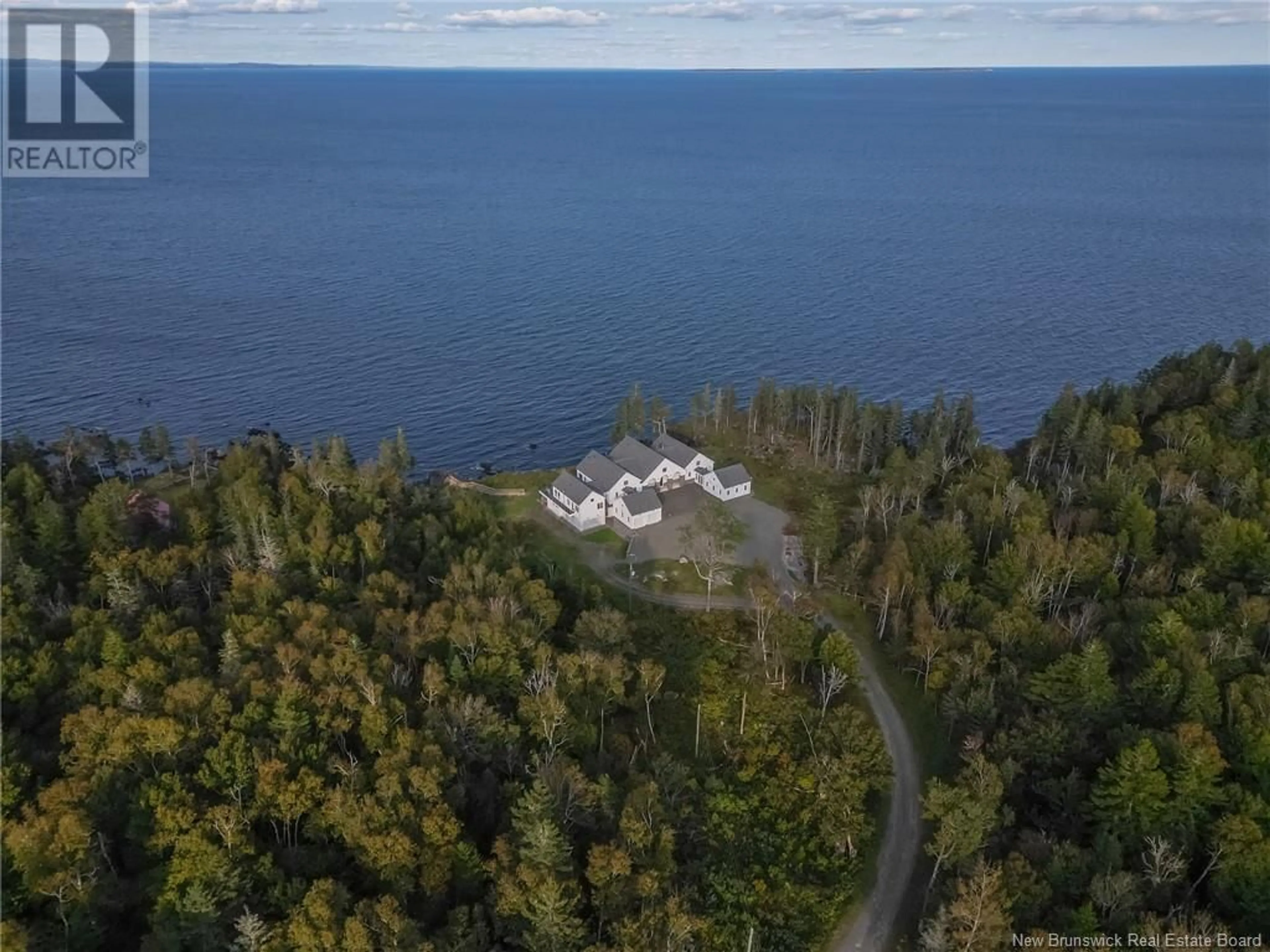 A pic from outside/outdoor area/front of a property/back of a property/a pic from drone, water/lake/river/ocean view for 868 FUNDY DRIVE, Wilsons Beach New Brunswick E5E1X5