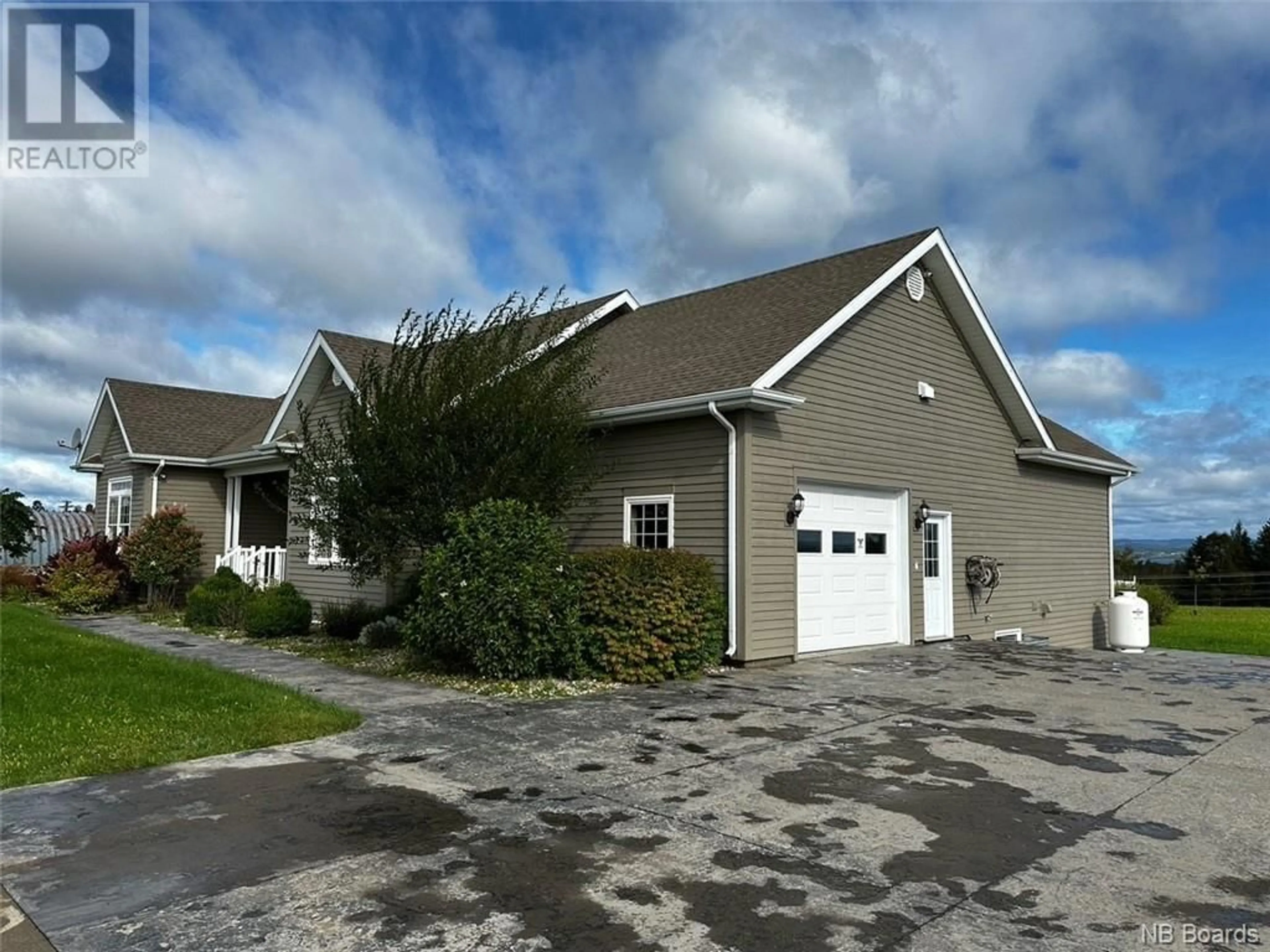 Frontside or backside of a home, cottage for 163 Craig Street, Charlo New Brunswick E8E2J3