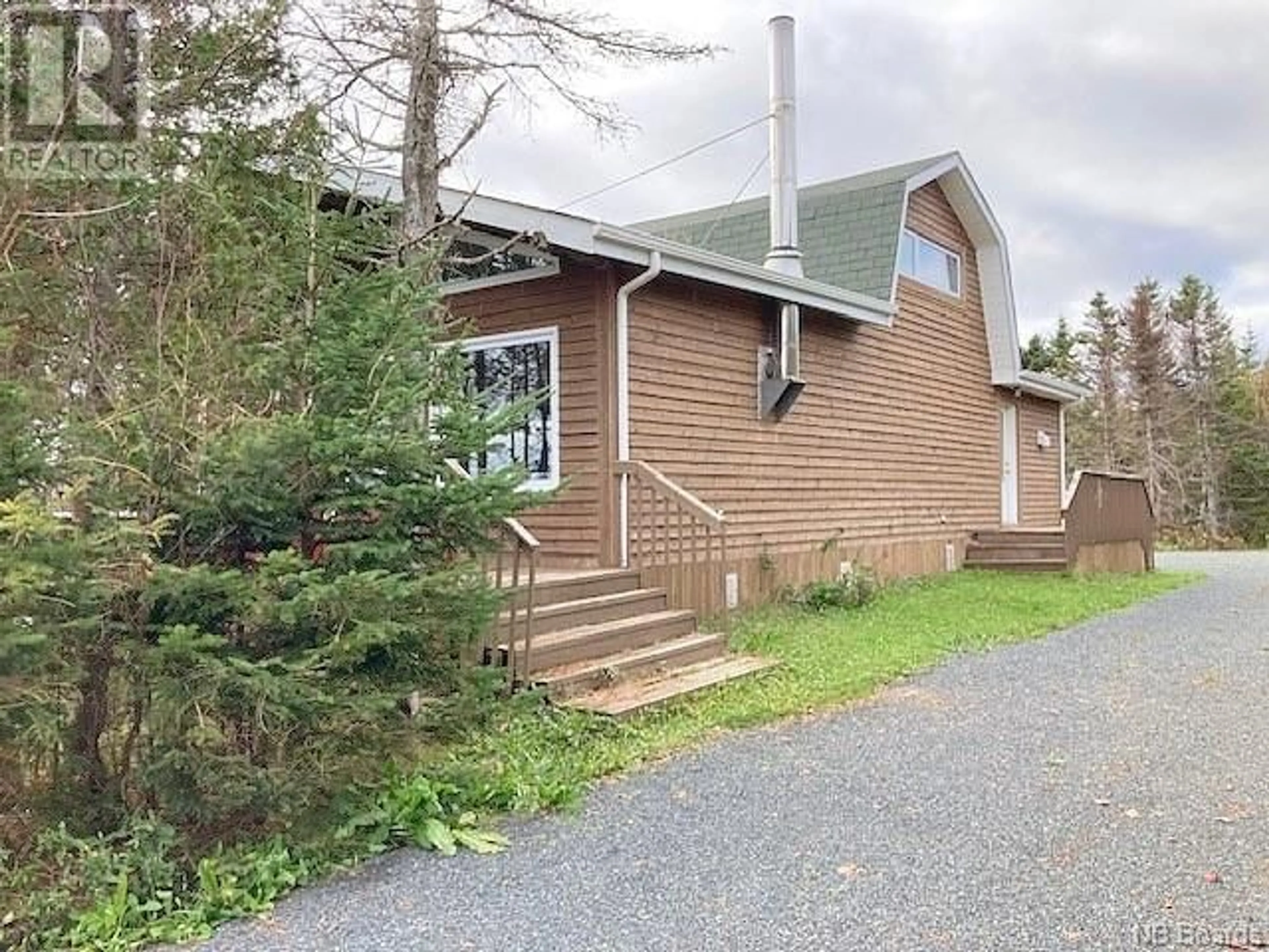 A pic from outside/outdoor area/front of a property/back of a property/a pic from drone, unknown for 9 RUE PAULIN, Saint-Marie-Saint-Raphaël New Brunswick E8T1T7