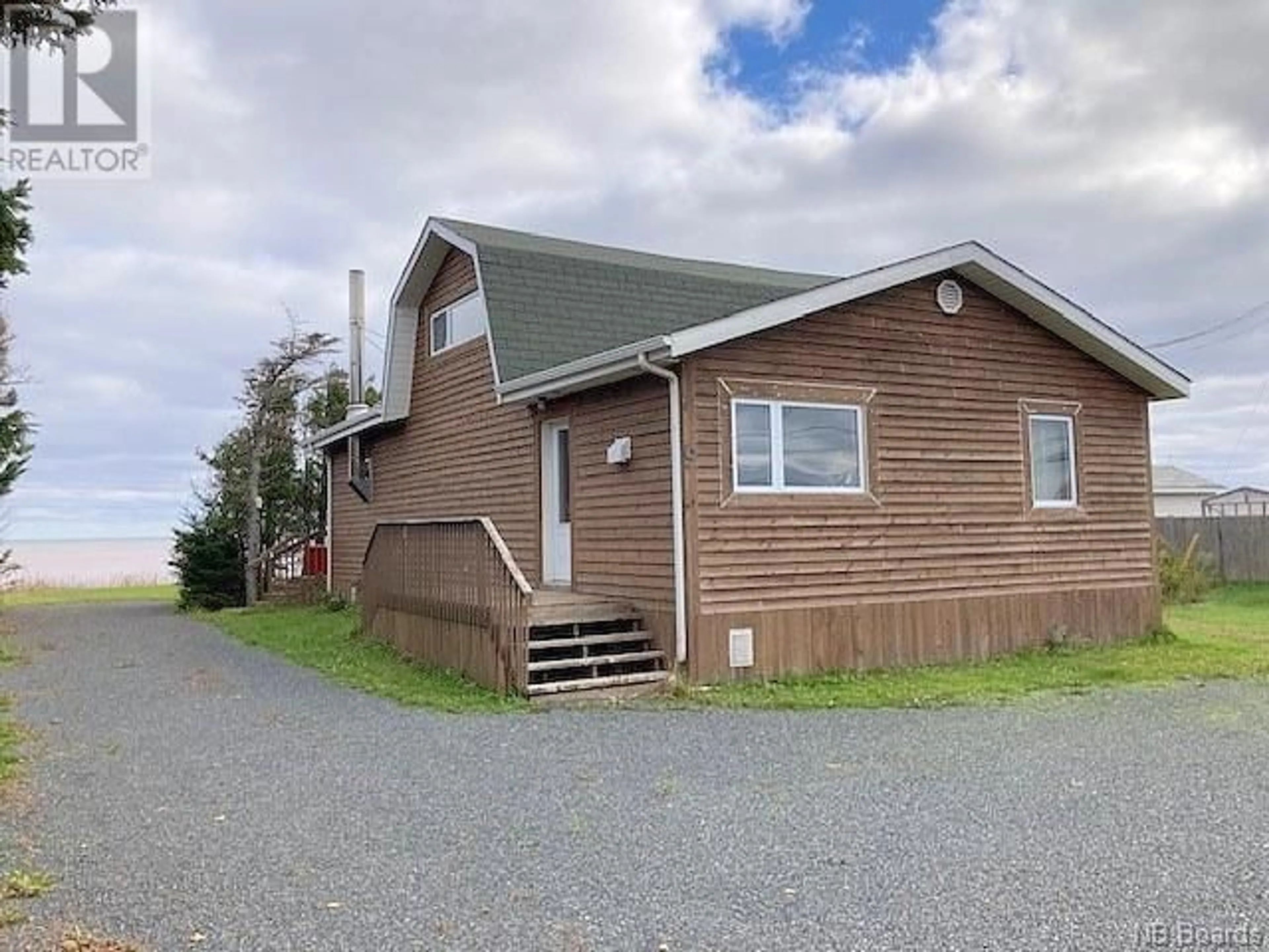 A pic from outside/outdoor area/front of a property/back of a property/a pic from drone, building for 9 RUE PAULIN, Saint-Marie-Saint-Raphaël New Brunswick E8T1T7