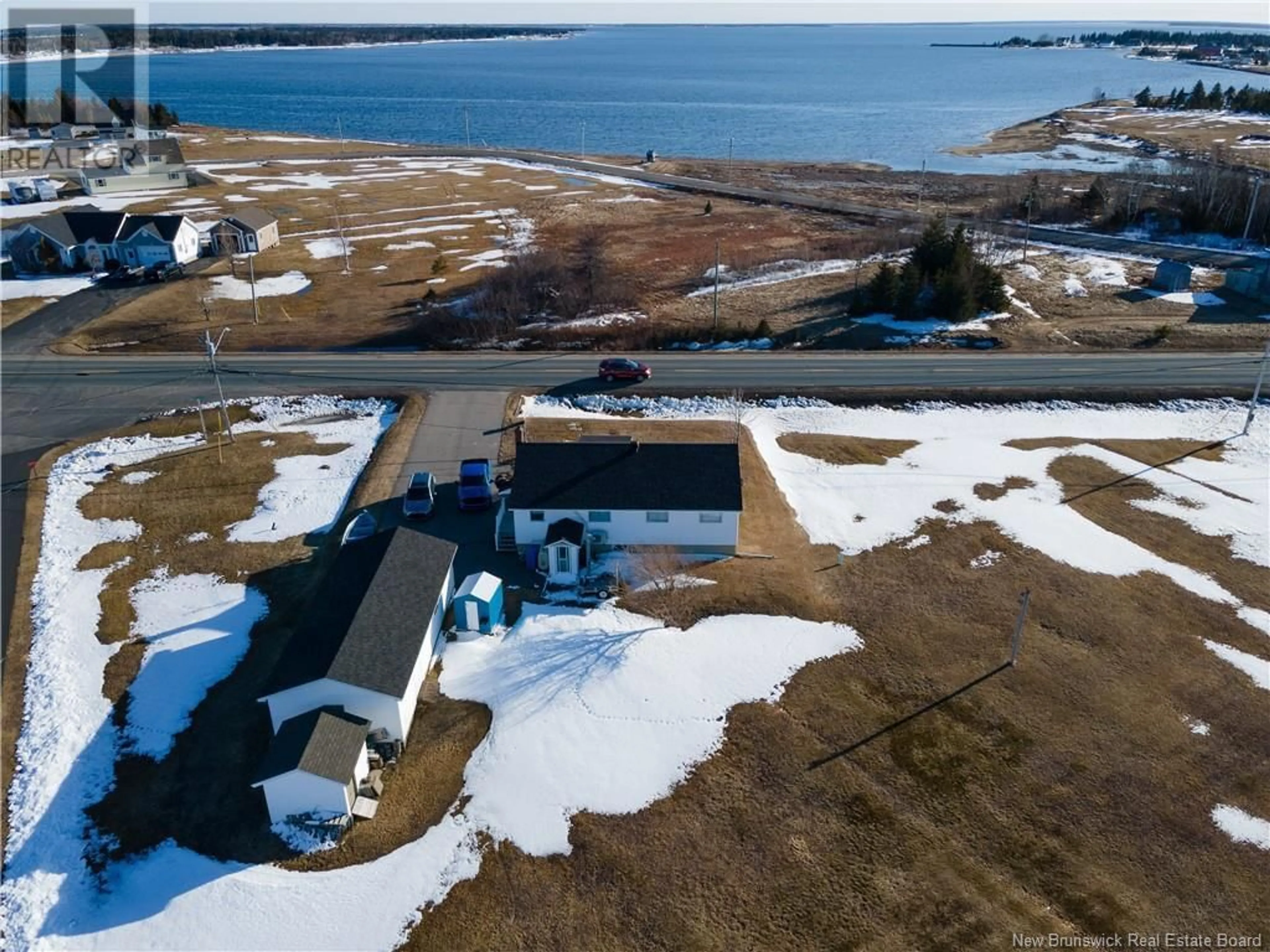 A pic from outside/outdoor area/front of a property/back of a property/a pic from drone, water/lake/river/ocean view for 6330 ROUTE 313, Petite-Lamèque New Brunswick E8T2R3