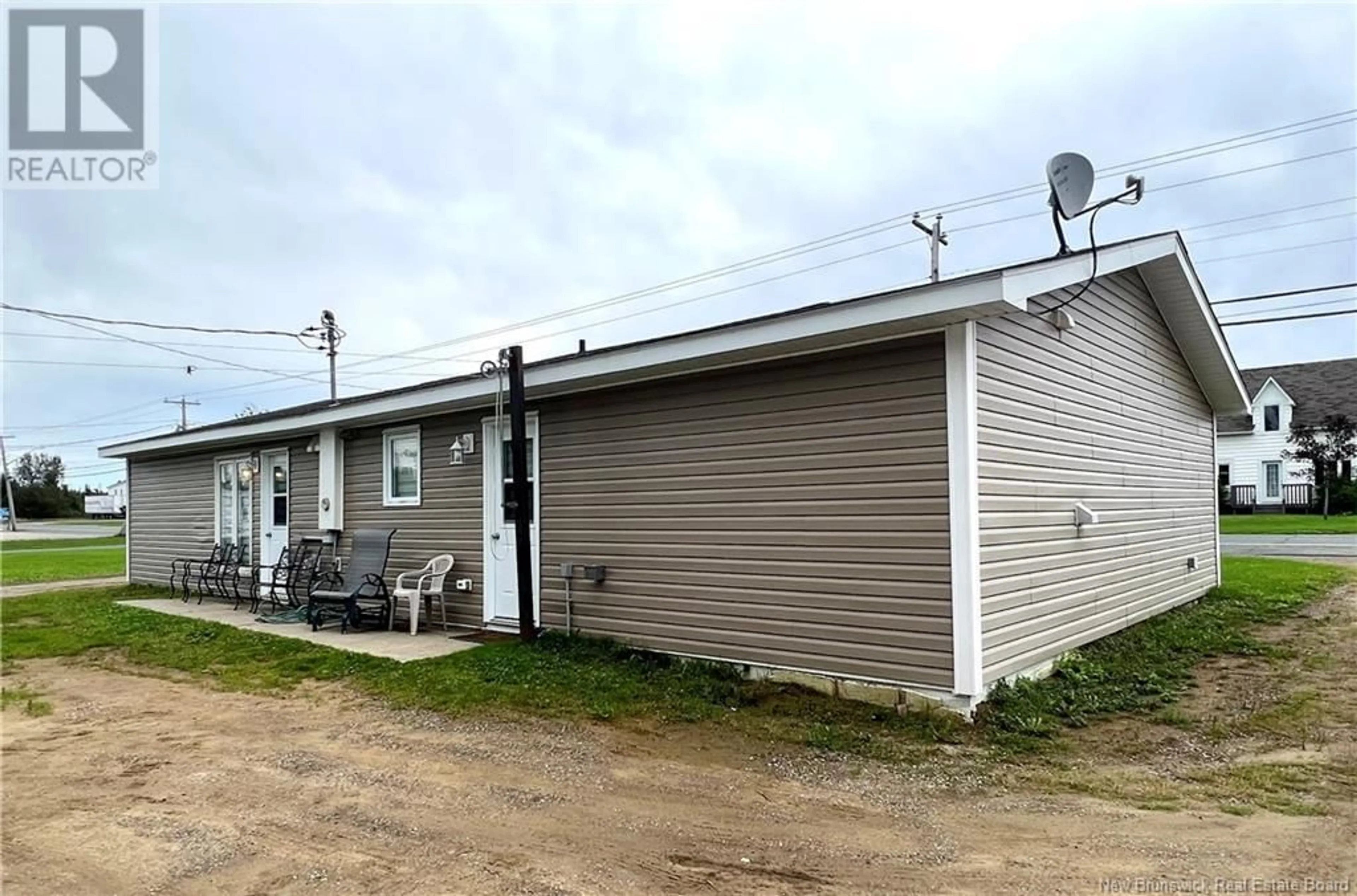 A pic from exterior of the house or condo, the front or back of building for 210 Rue du Pêcheur Nord Unit# A-B, Lamèque New Brunswick E8T1K2