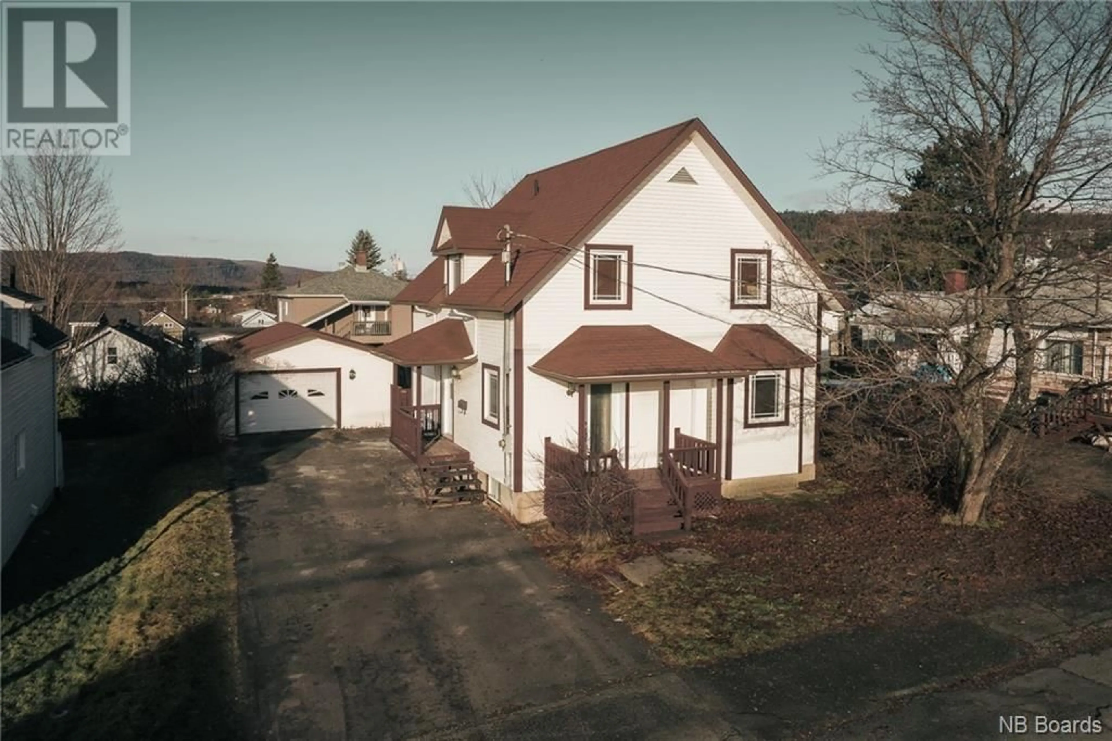 A pic from outside/outdoor area/front of a property/back of a property/a pic from drone, street for 124 34TH AVENUE, Edmundston New Brunswick E3V2T6