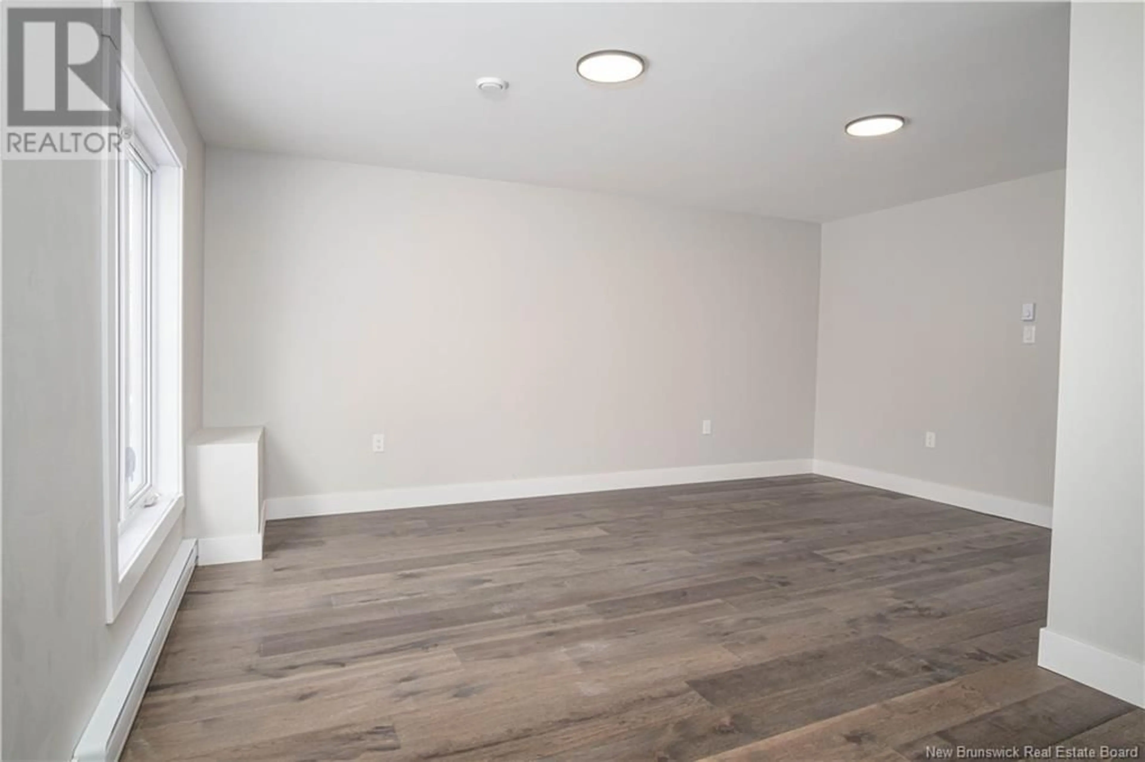 A pic of a room, wood floors for 6 Rockingstone Drive, Saint John New Brunswick E2M0B5