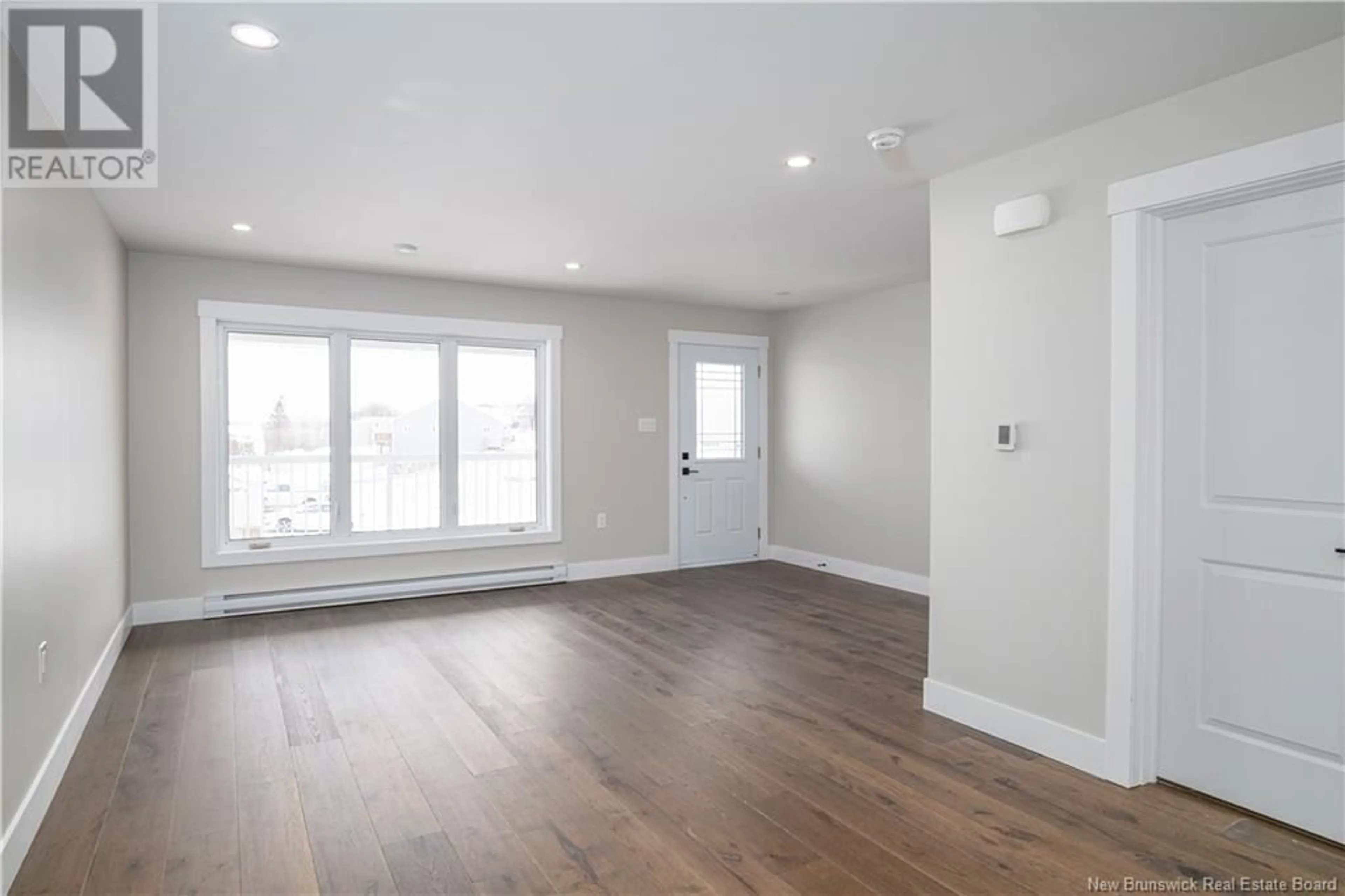 A pic of a room, wood floors for 6 Rockingstone Drive, Saint John New Brunswick E2M0B5