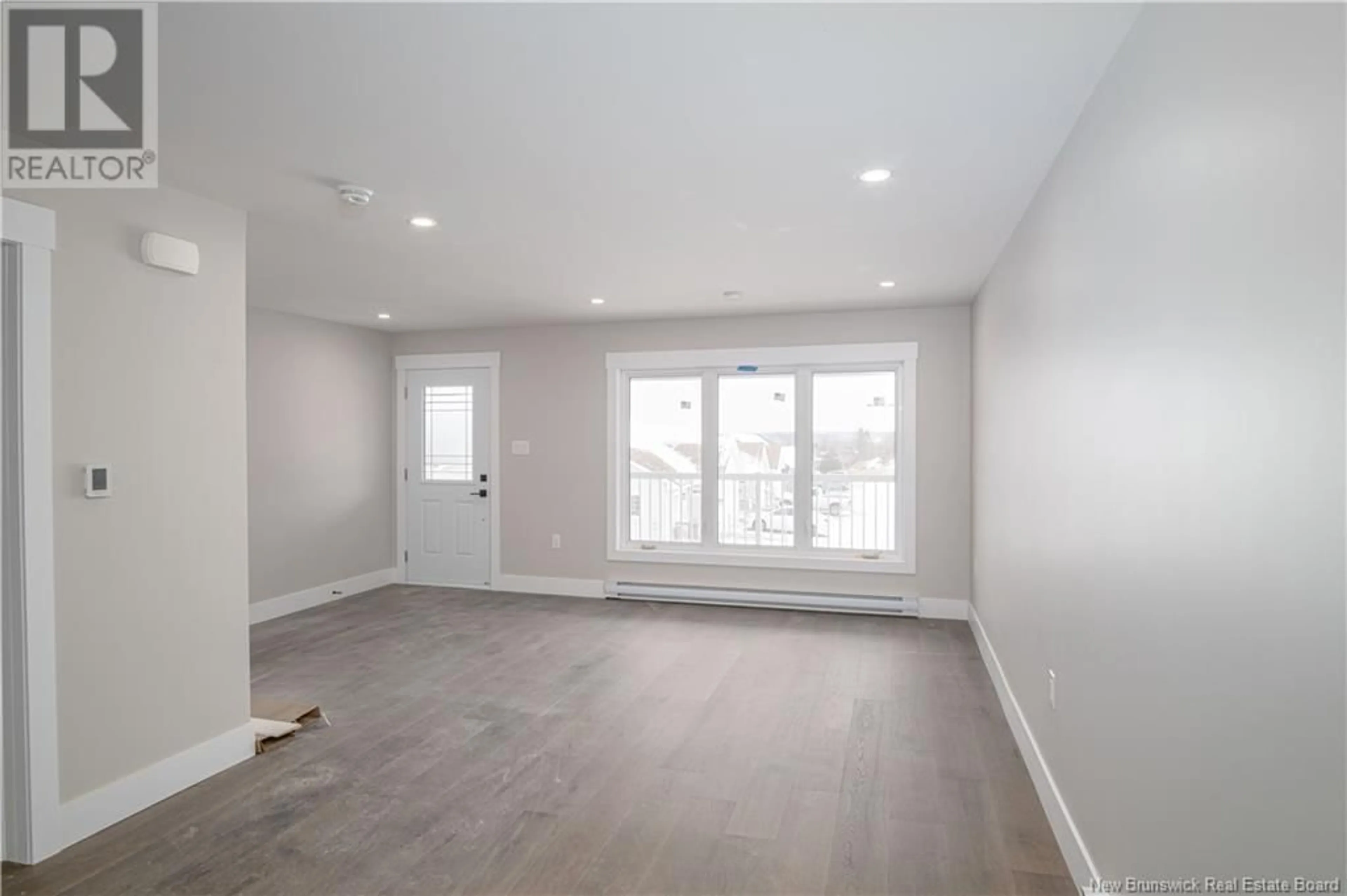 A pic of a room, wood floors for 8 Rockingstone Drive, Saint John New Brunswick E2M0B5