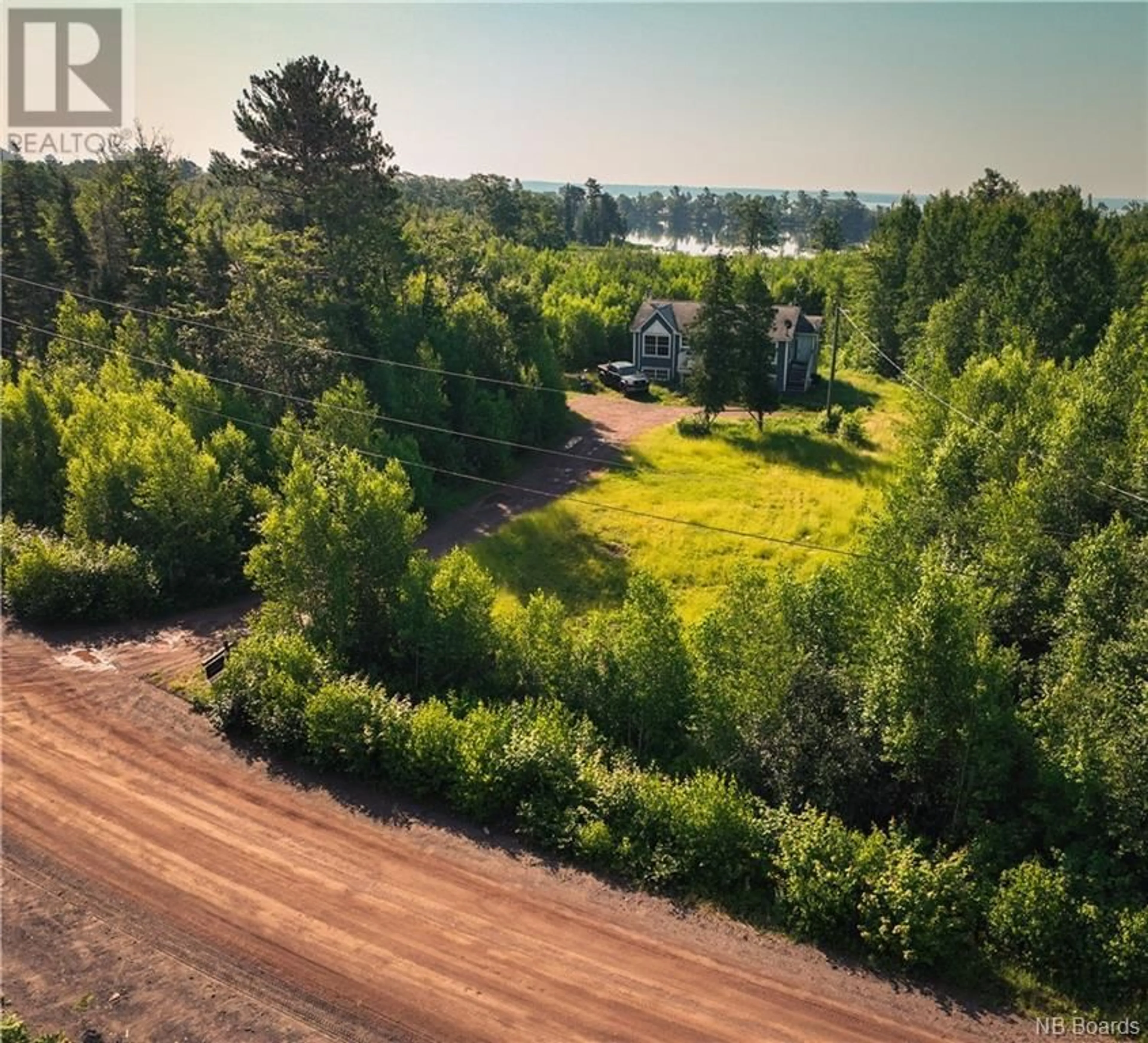 A pic from exterior of the house or condo, the fenced backyard for 71 Keyhole Road, Princess Park New Brunswick E4B4C9