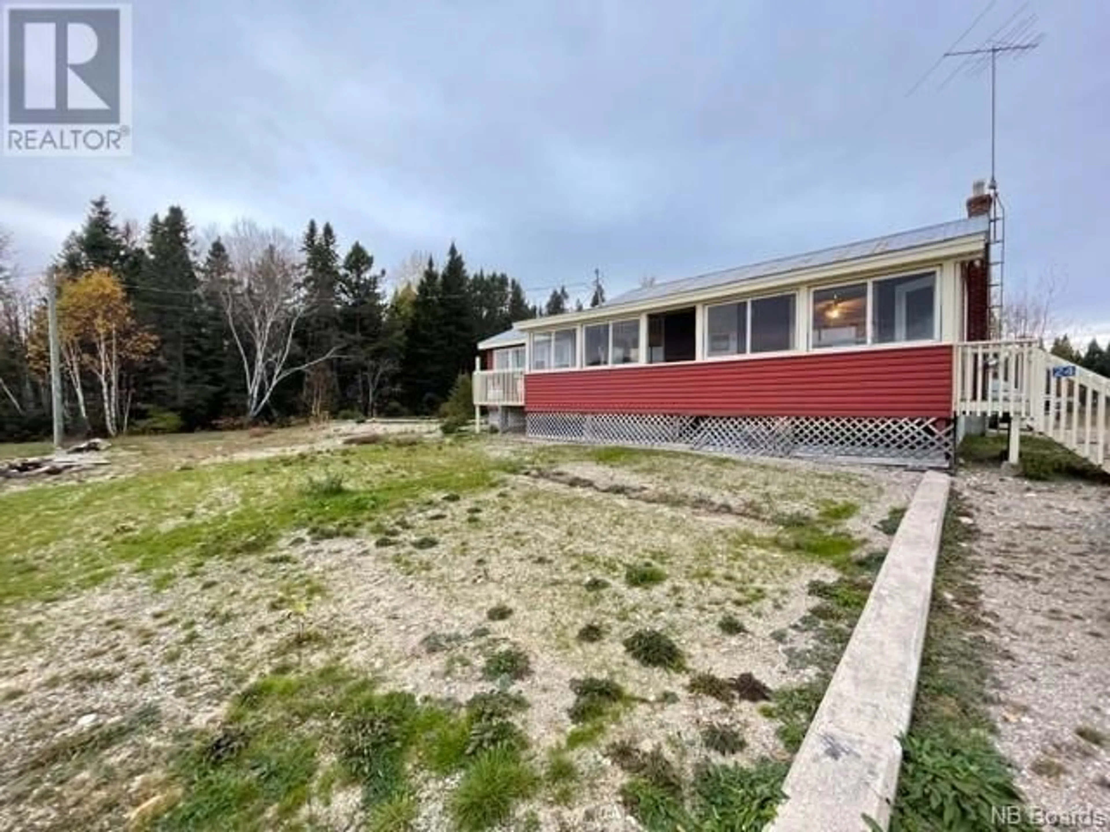 Frontside or backside of a home, the fenced backyard for 24 Frank Copp Road, Wayerton New Brunswick E9E1P2