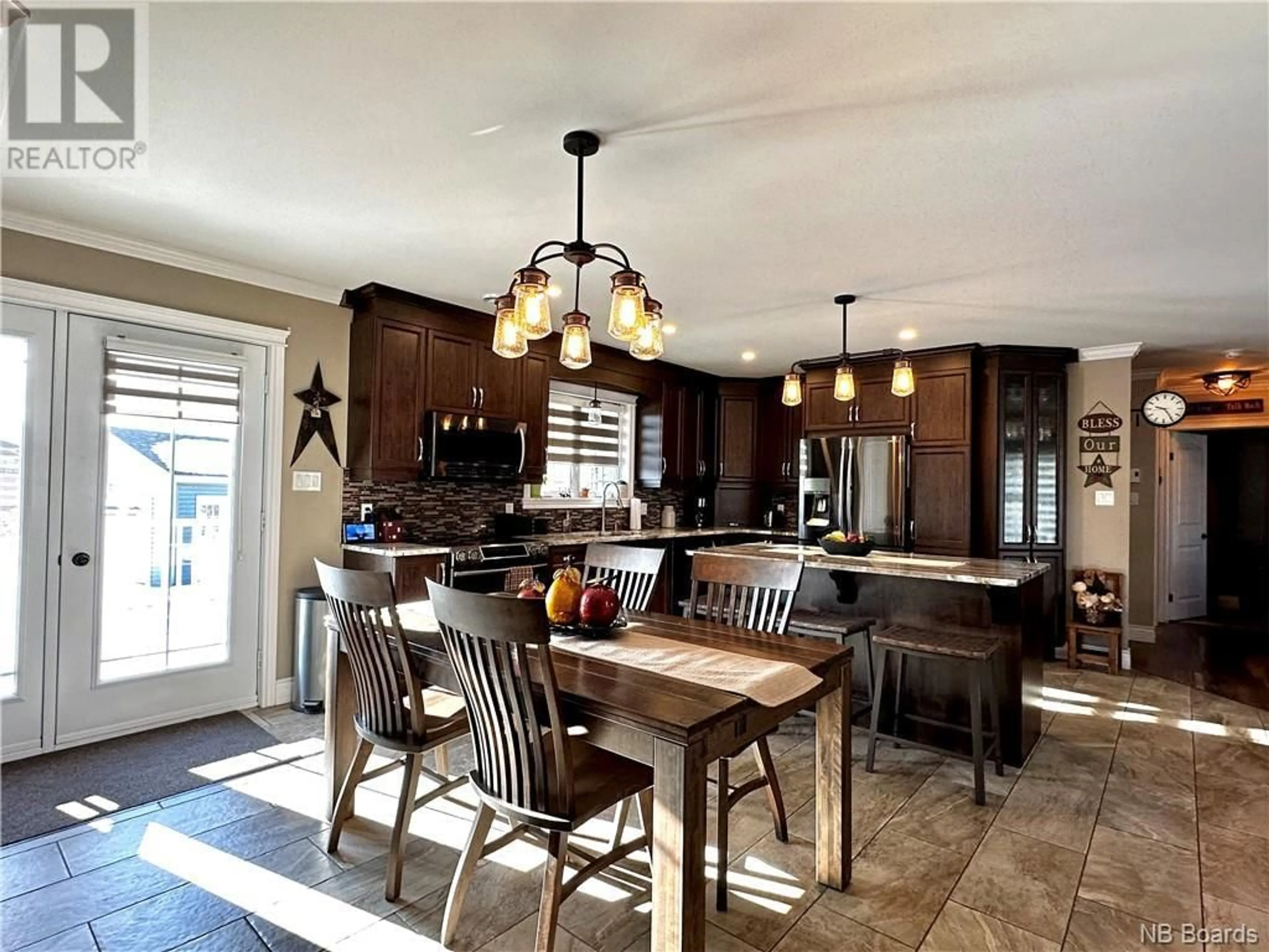 Open concept kitchen for 18 Rue Principale, Sainte-Anne-De-Madawaska New Brunswick E7E1B5